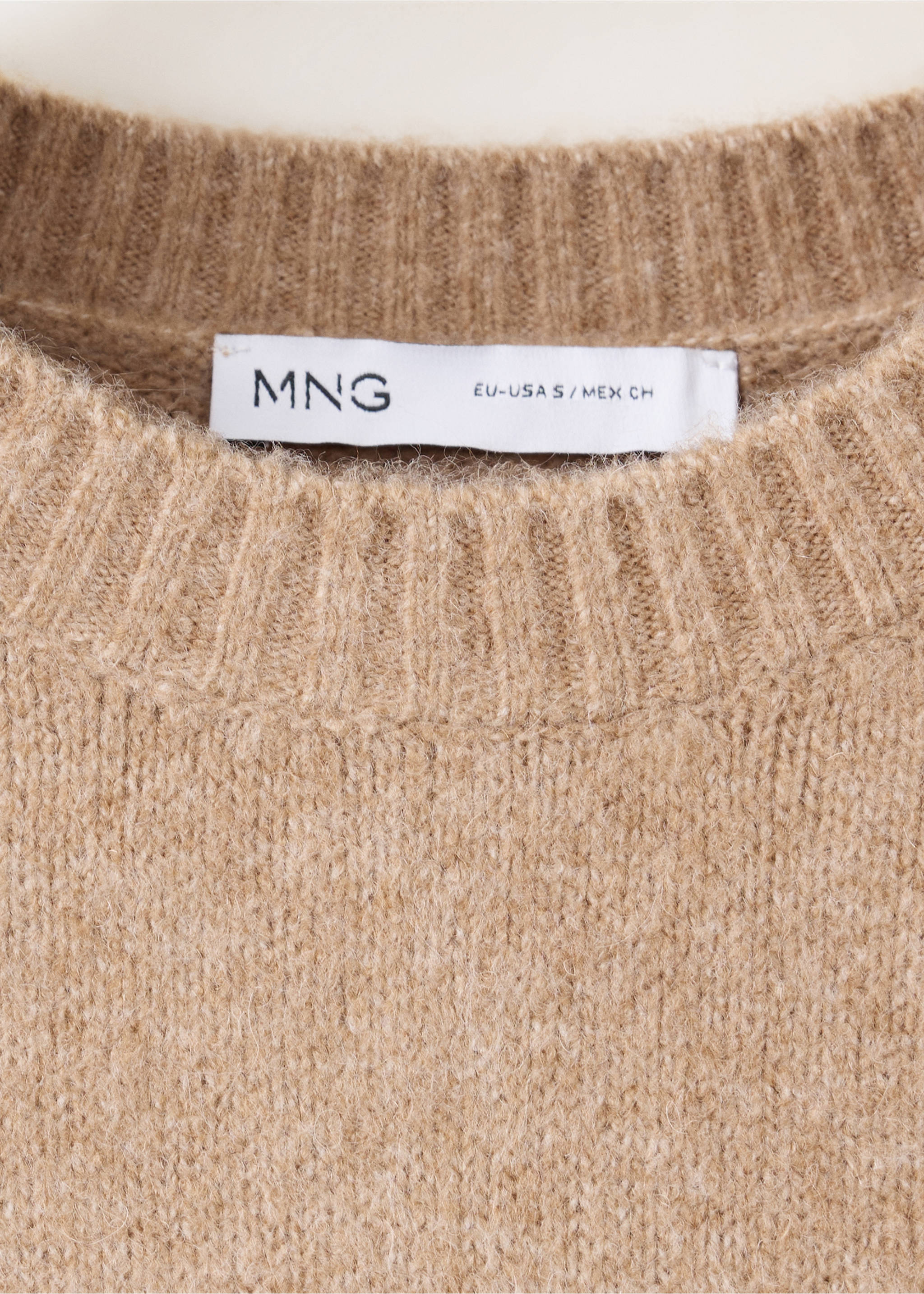 Close-up of a brown knit jersey featuring a ribbed crew neckline., Medium Brown. Ref: 37017781-00.