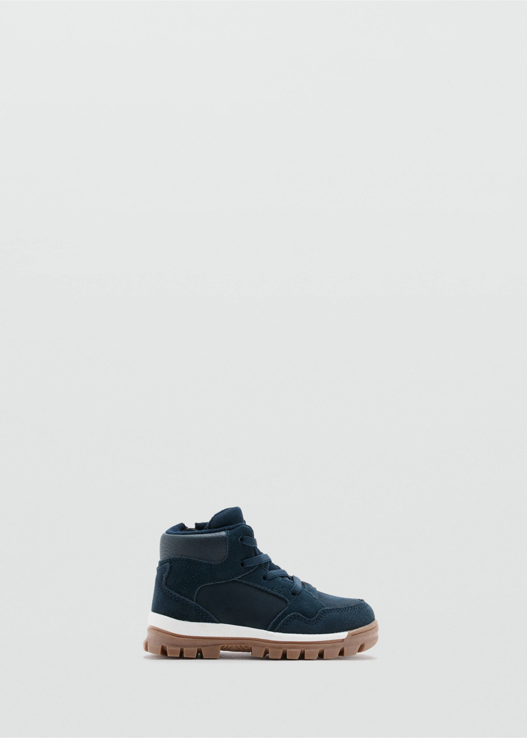 Dark blue ankle boot with laces, white midsole, and lug sole., Navy. Ref: 37017788-00.