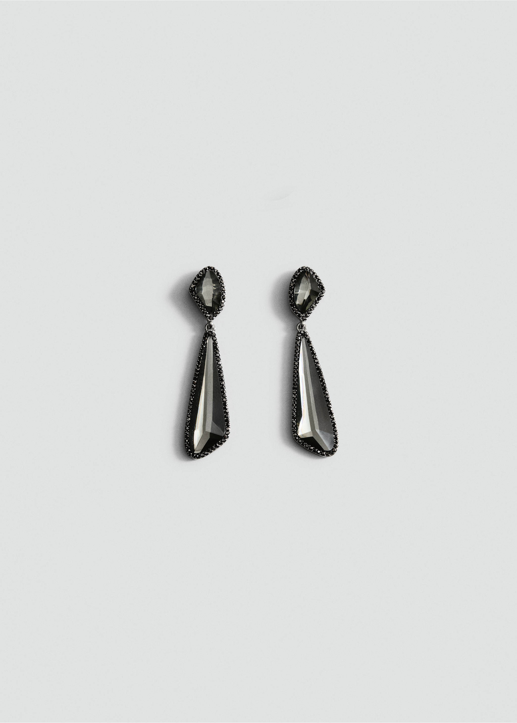 Dark grey crystal drop earrings with asymmetrical faceted stones and pavé edging., Silver. Ref: 37017800-00.
