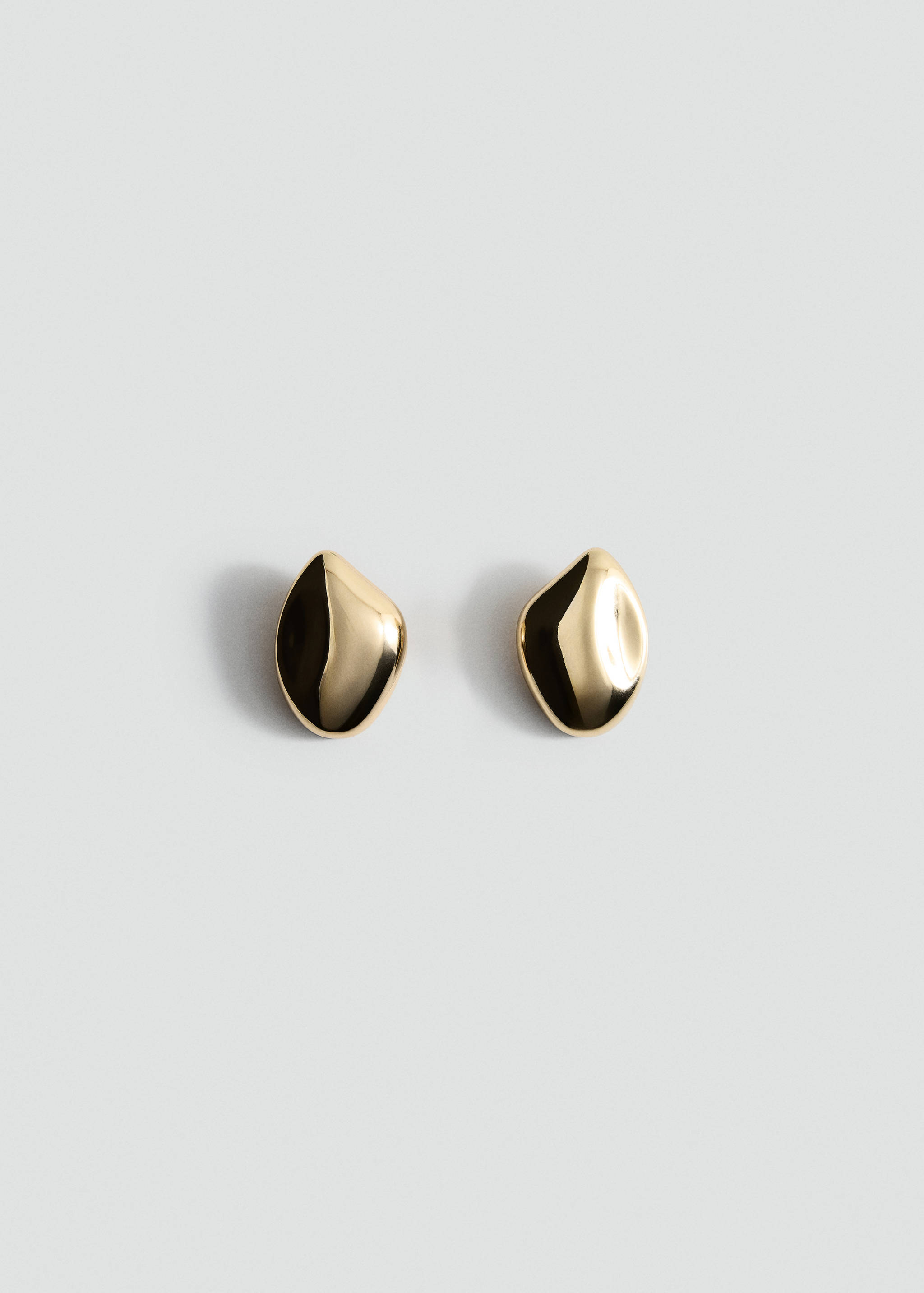 Gold-finish metal earrings with an asymmetric organic pebble shape.
