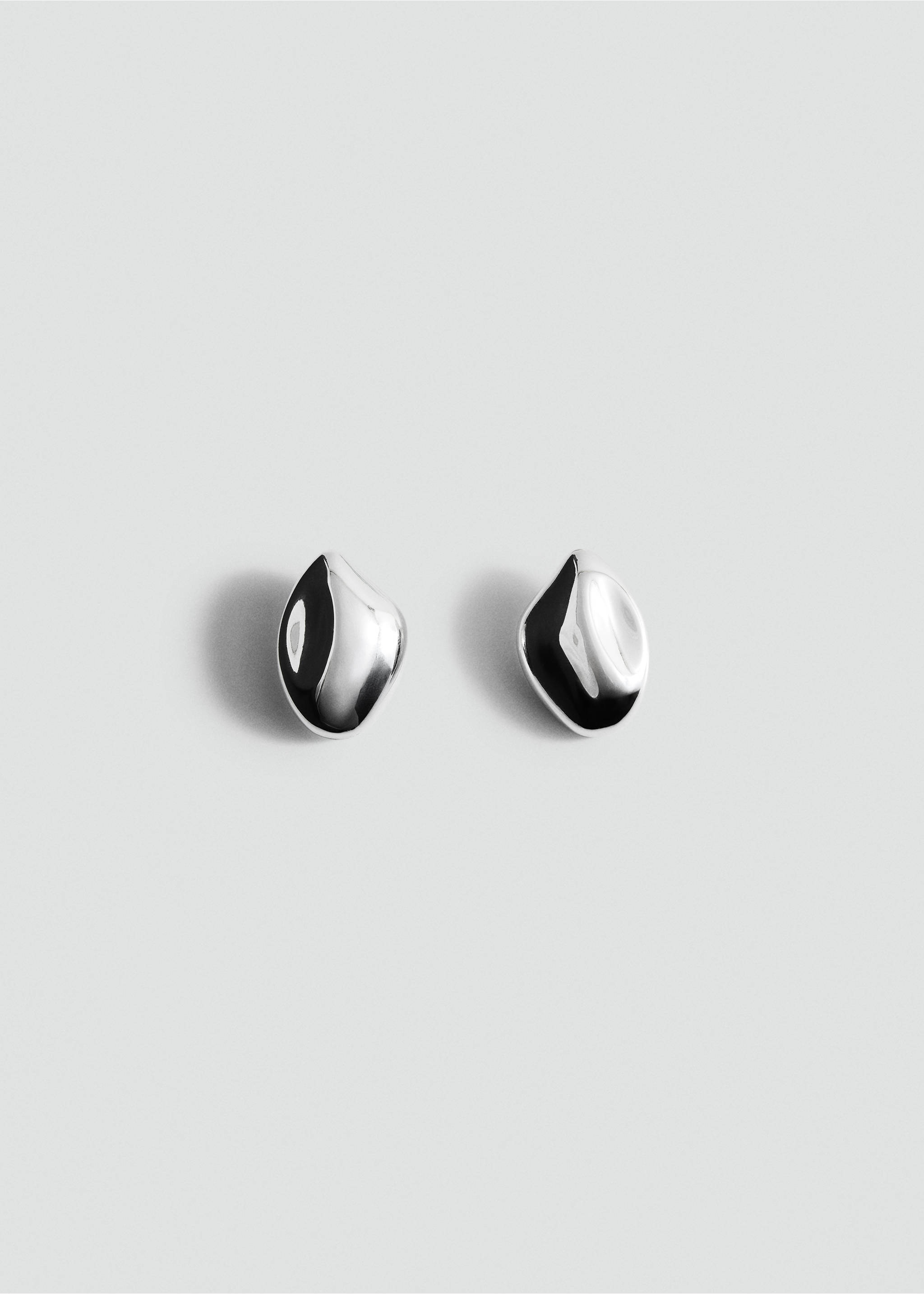 Silver-toned metallic earrings with an asymmetrical, polished droplet shape., Silver. Ref: 37017804-00.