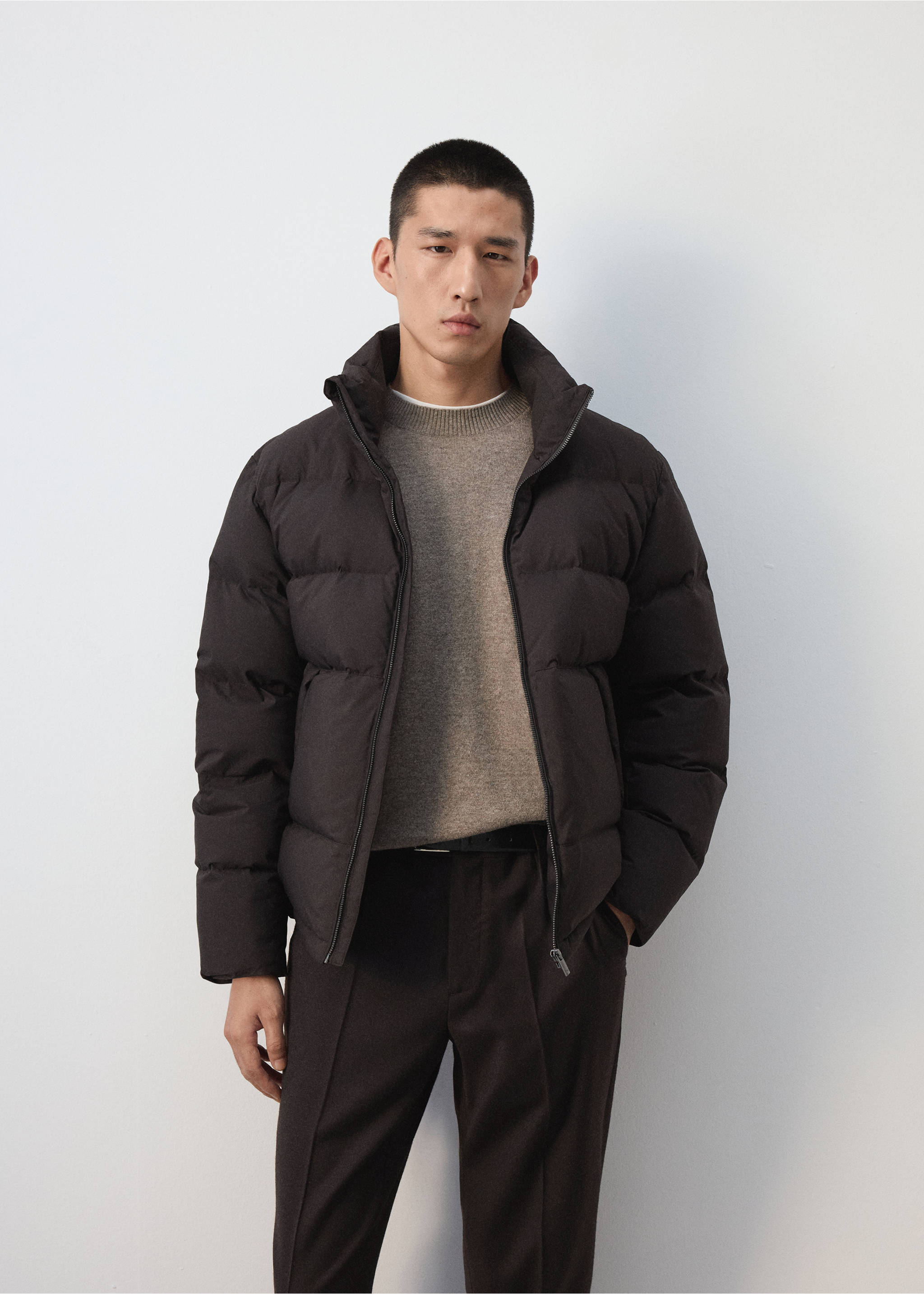 Dark brown quilted anorak worn over a grey jumper., Chocolate. Ref: 37017887-00.