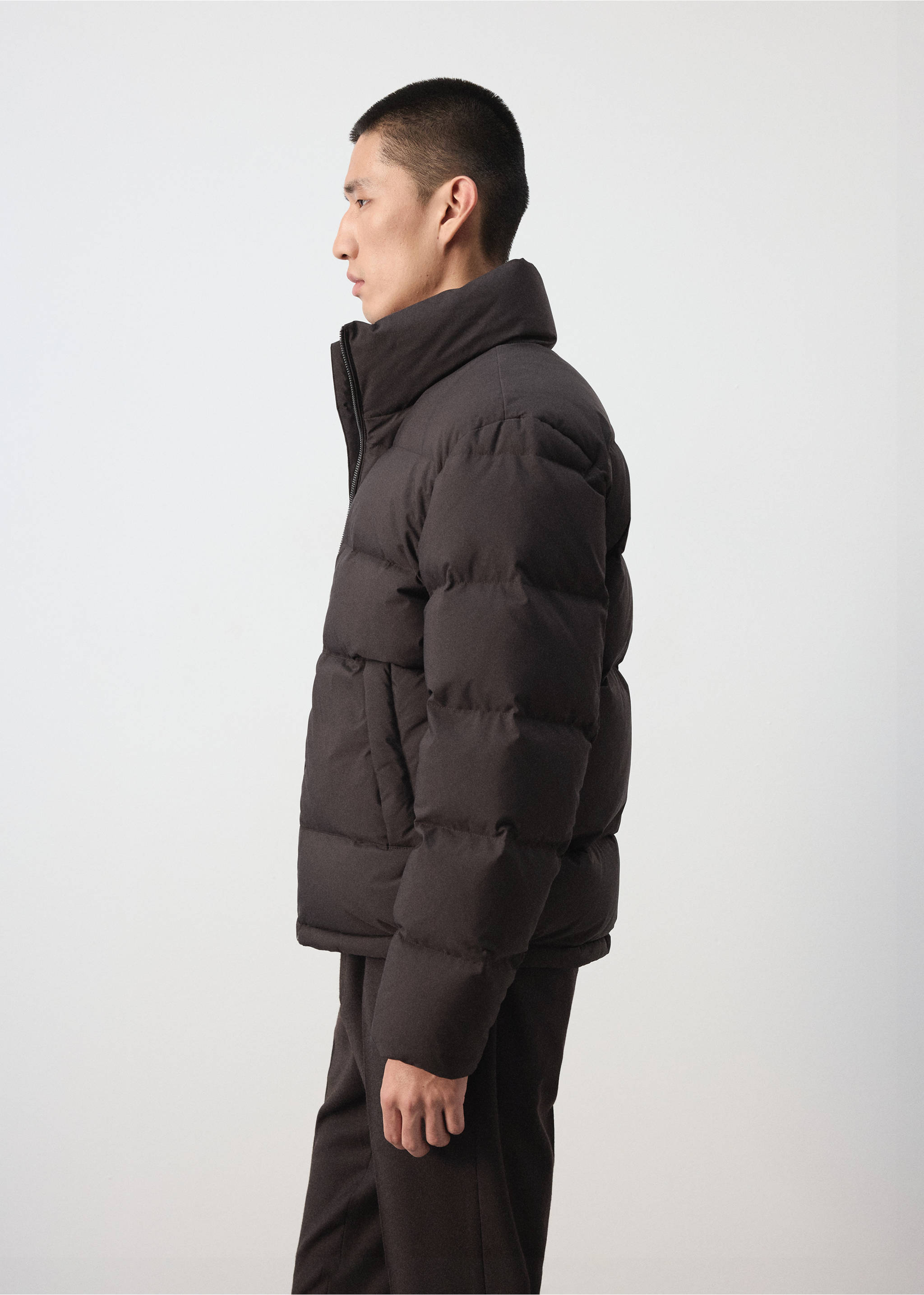 Dark grey puffer anorak with a high funnel neck and horizontal quilting., Chocolate. Ref: 37017887-00.