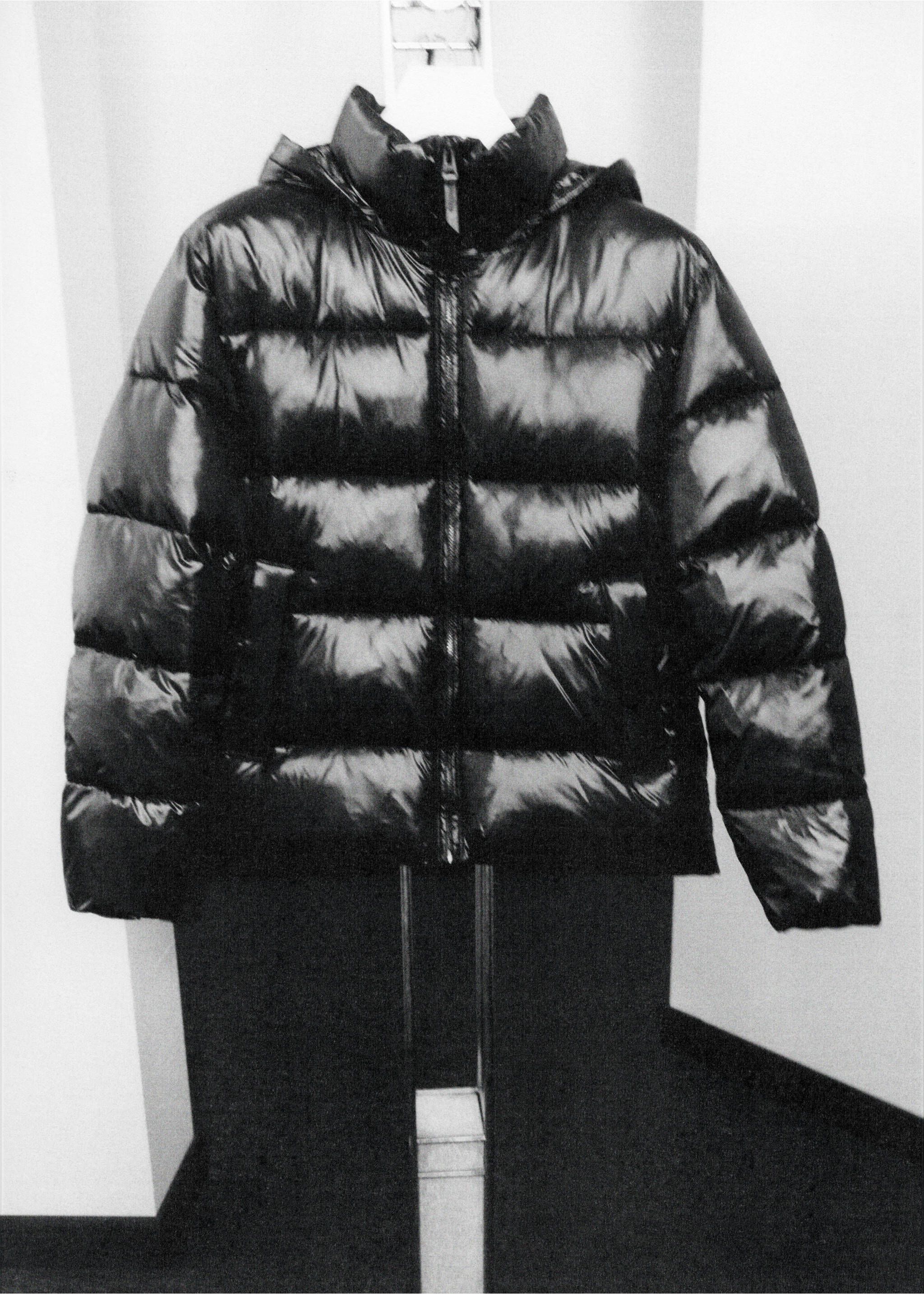 Black glossy quilted anorak with a high collar and a front zip., Black. Ref: 37017892-00.