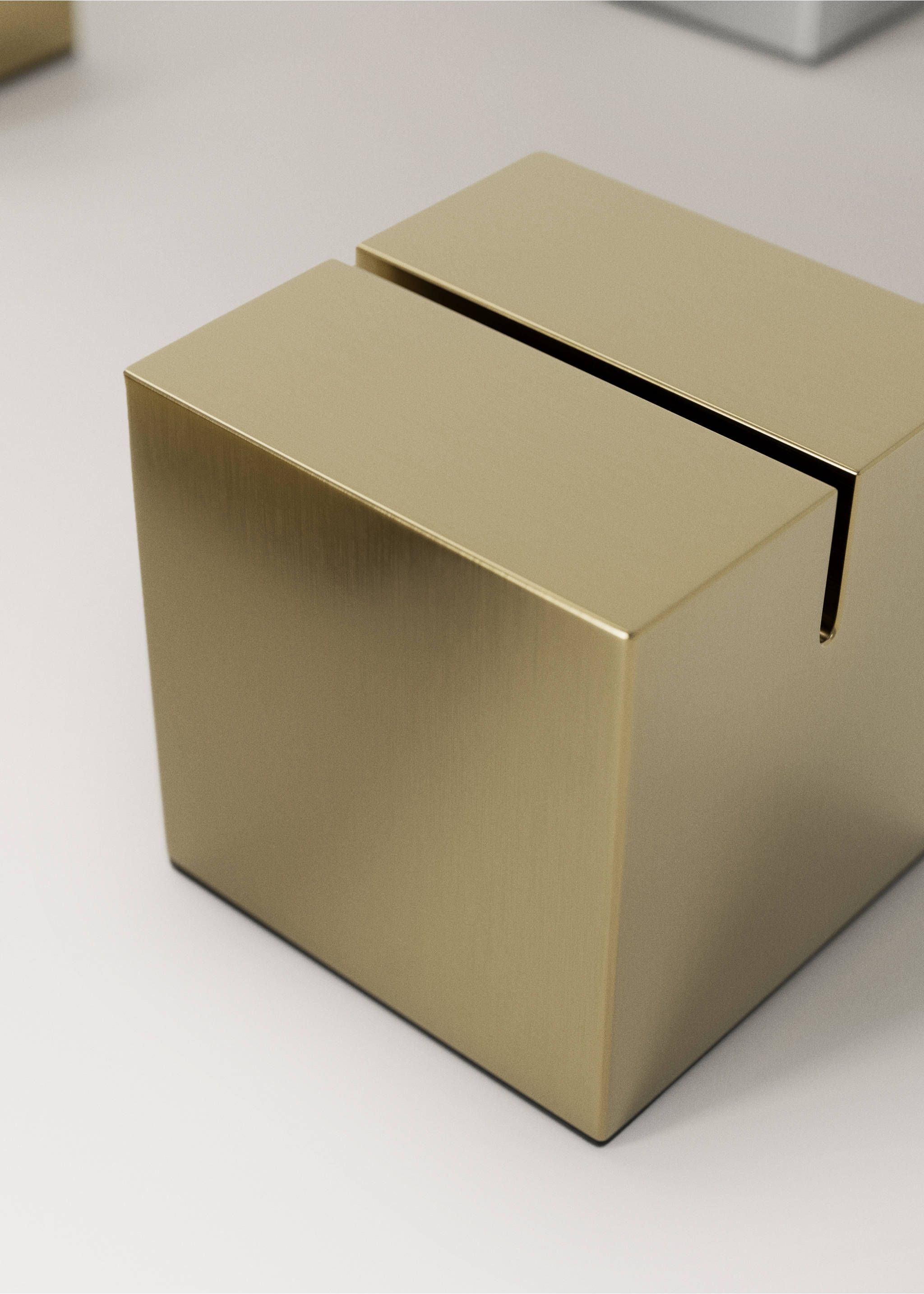 Gold metallic cube gadget with a top slot detail., Gold. Ref: 37017893-00.