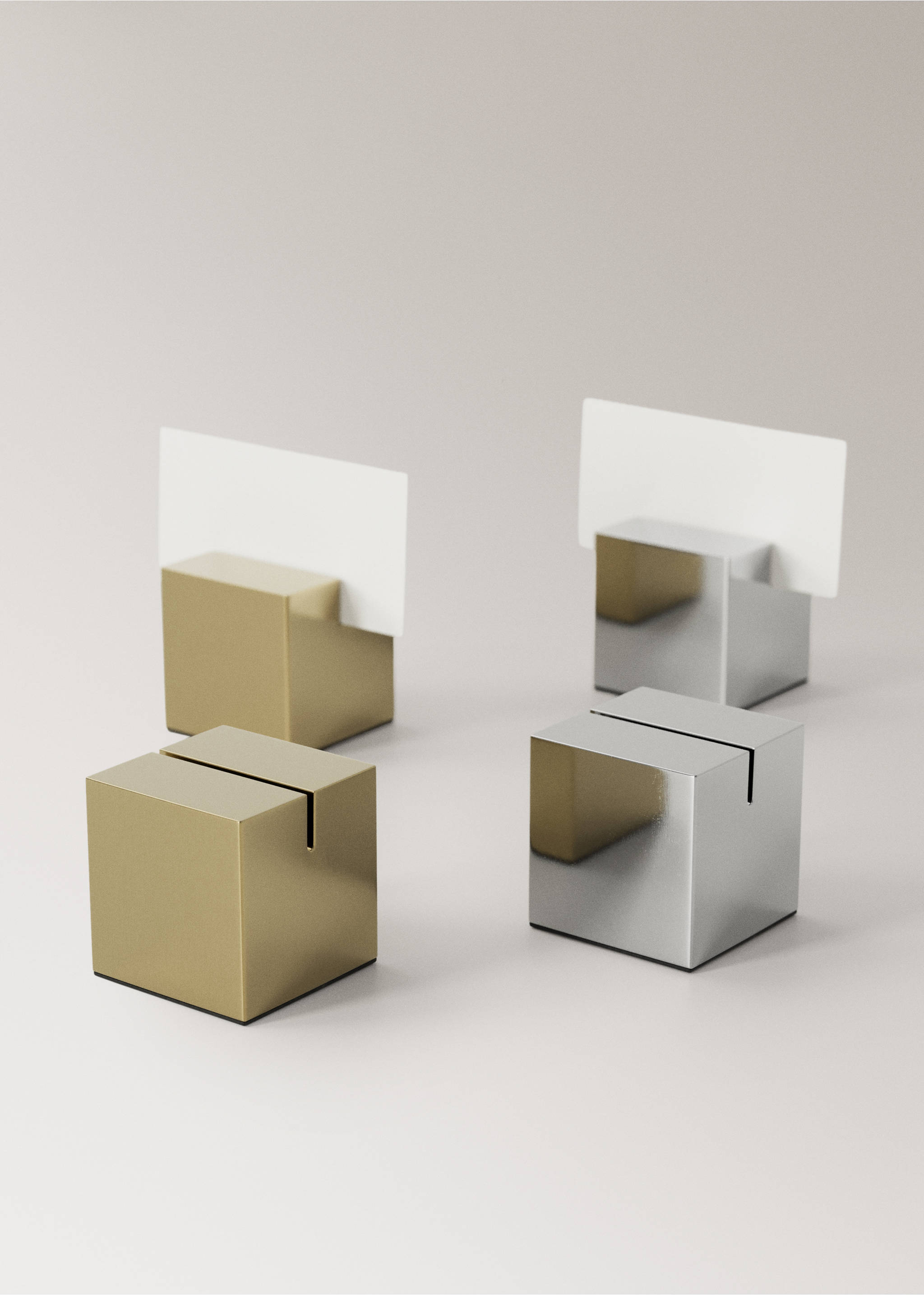 Four metal cube card holders in matte gold and reflective silver finishes with slots., Silver. Ref: 37017893-00.