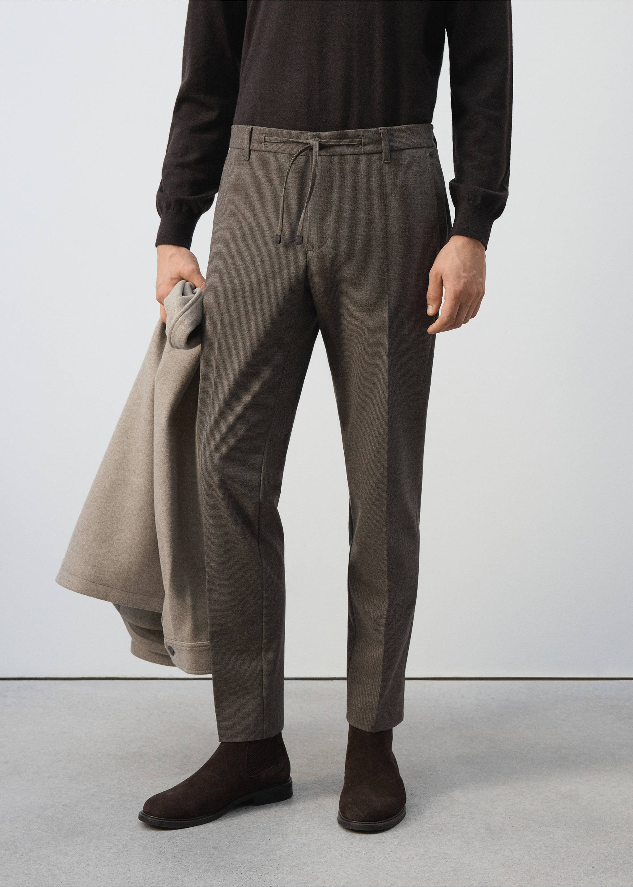 Brown straight trousers with a drawstring waistband and pressed creases., Tobacco Brown. Ref: 37017901-00.