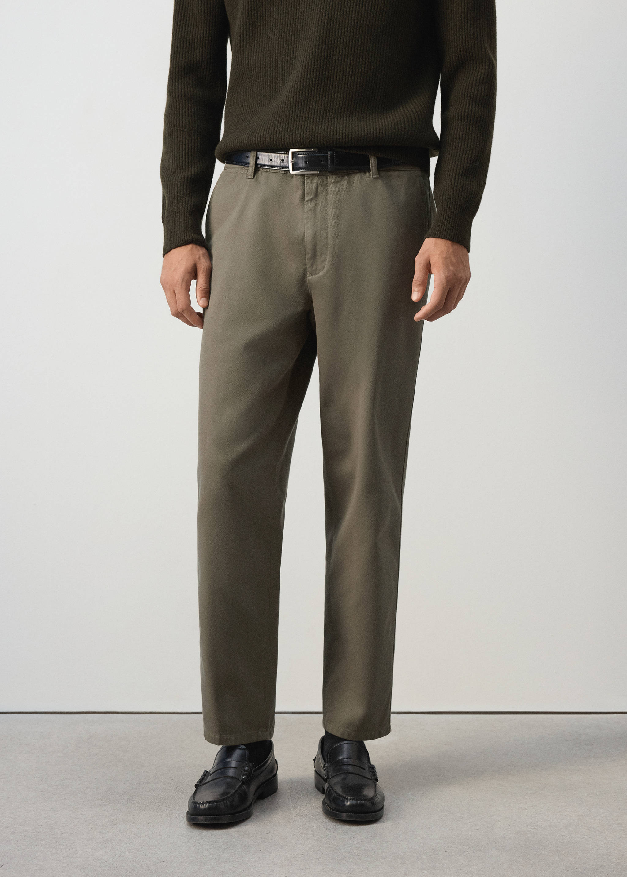 Khaki-green straight-leg trousers with belt loops and a zipped fly.
