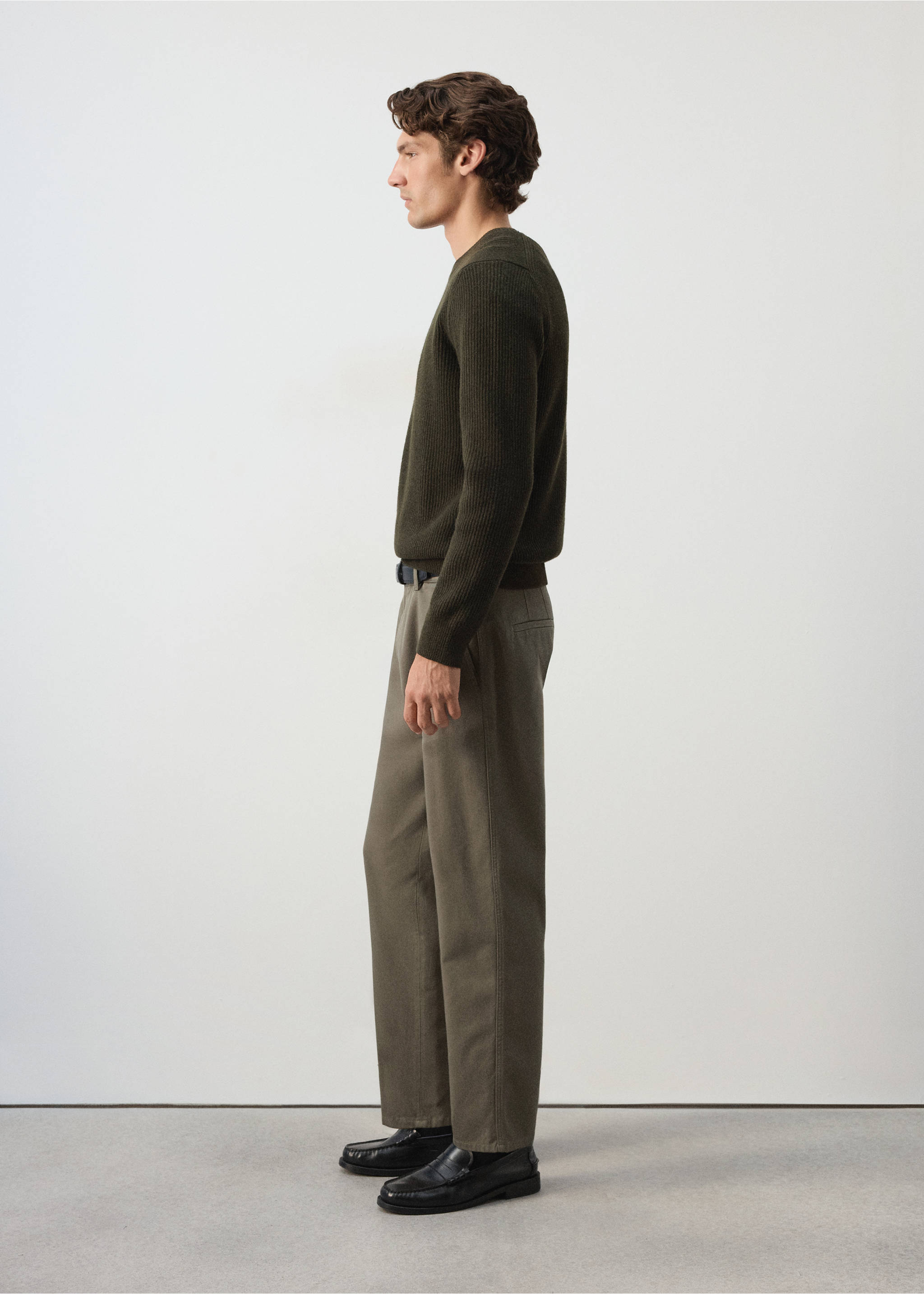 Olive green straight trousers worn with a dark green jumper and black loafers., Medium Brown. Ref: 37017905-00.