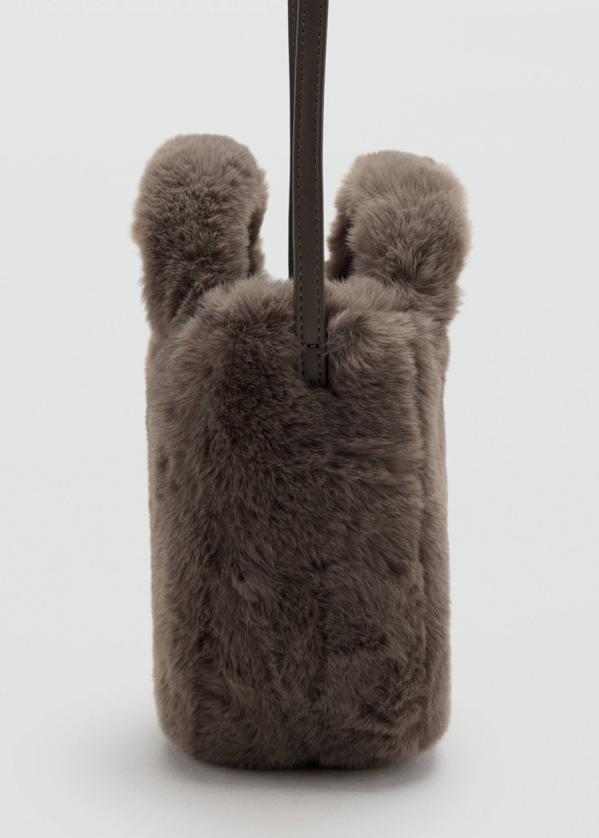 Grey faux-fur mini bag with top handles and a shoulder strap.