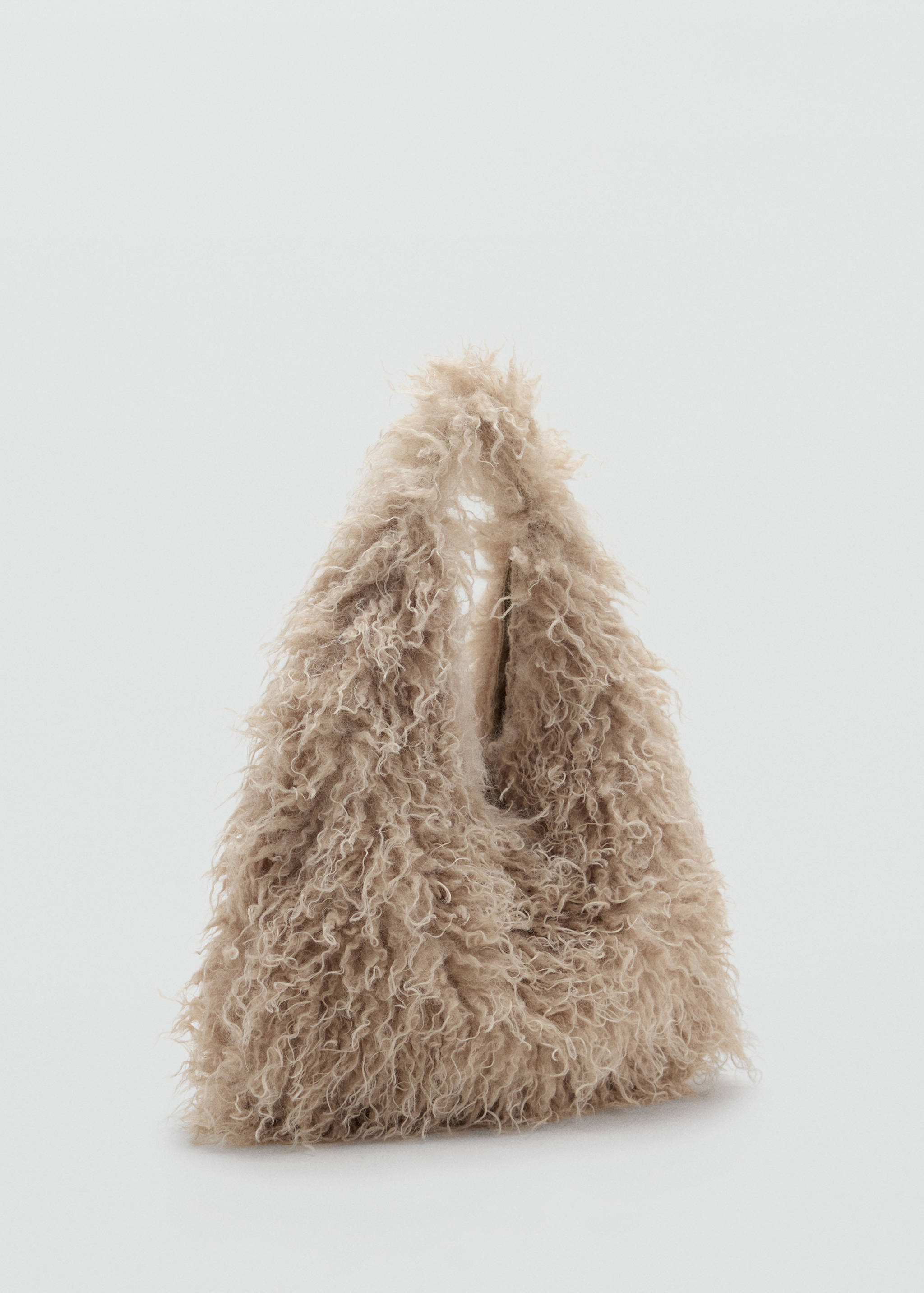 Beige faux-fur mini handbag in a slouchy triangular silhouette.