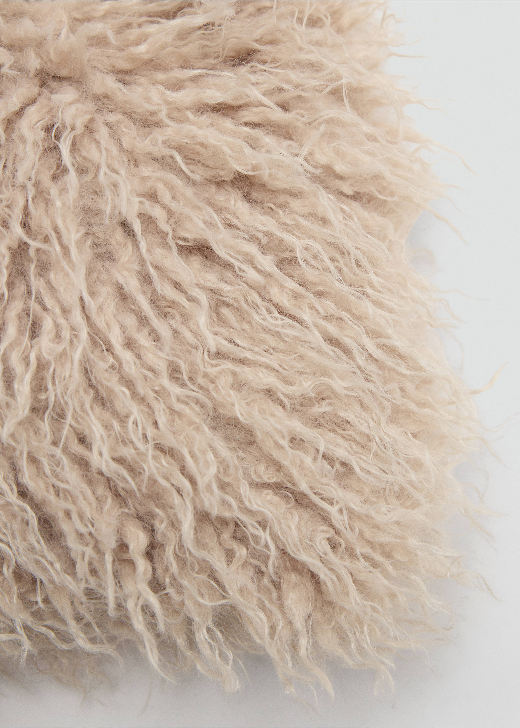 Close-up of a beige mini bag with a textured faux-fur finish., Sand. Ref: 37017914-00.