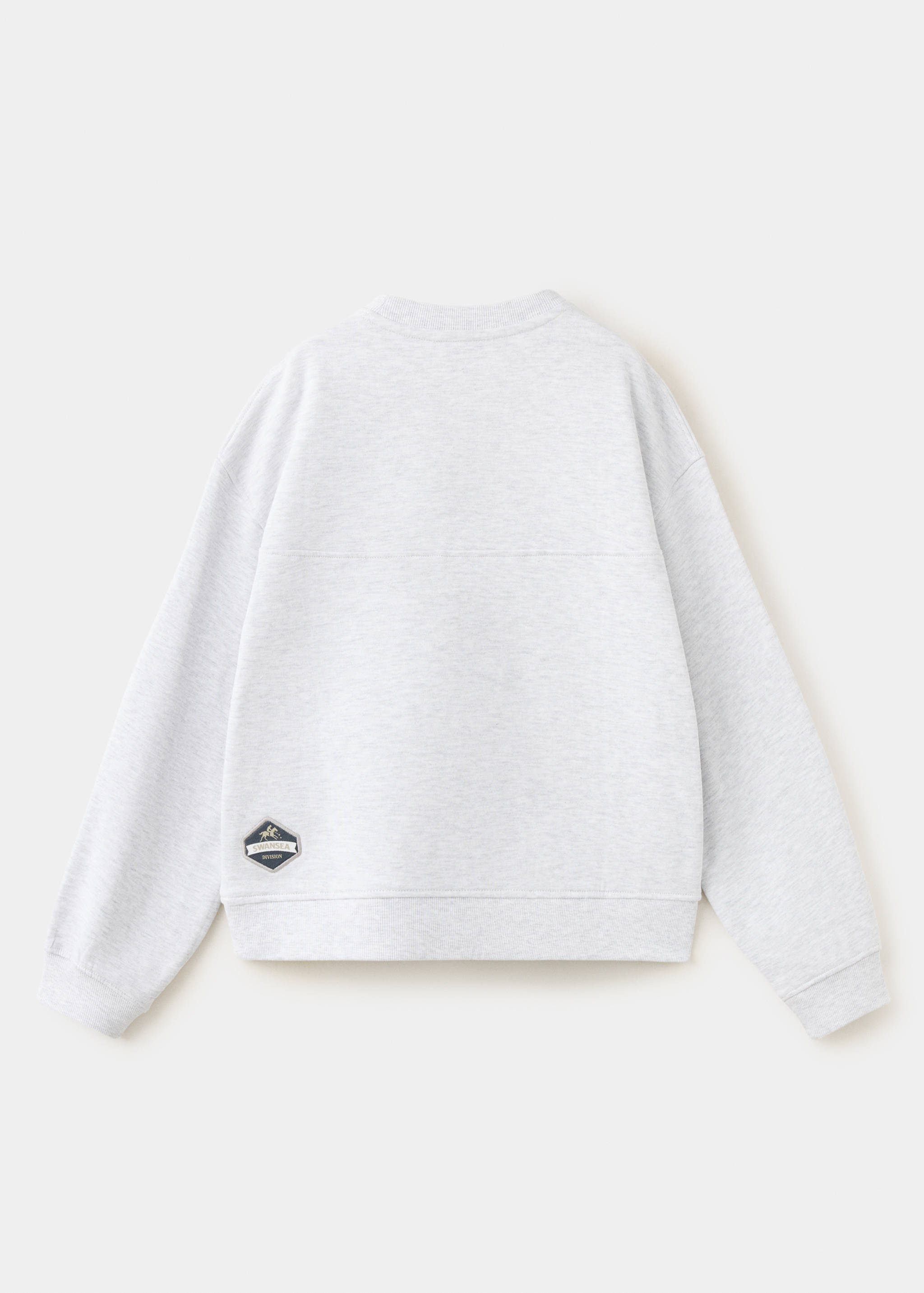 Back of a light grey marl kids sweatshirt with a patch.