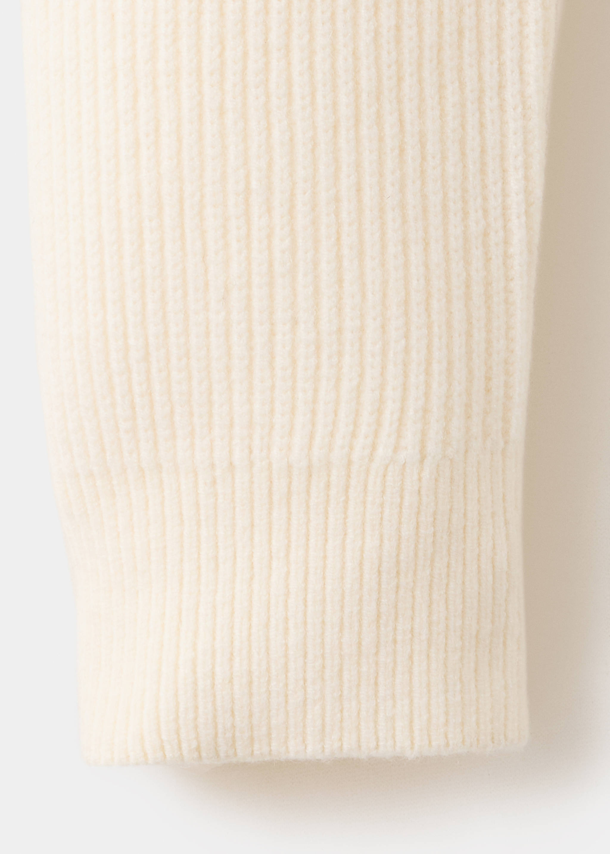Cream knitted jersey fabric detail