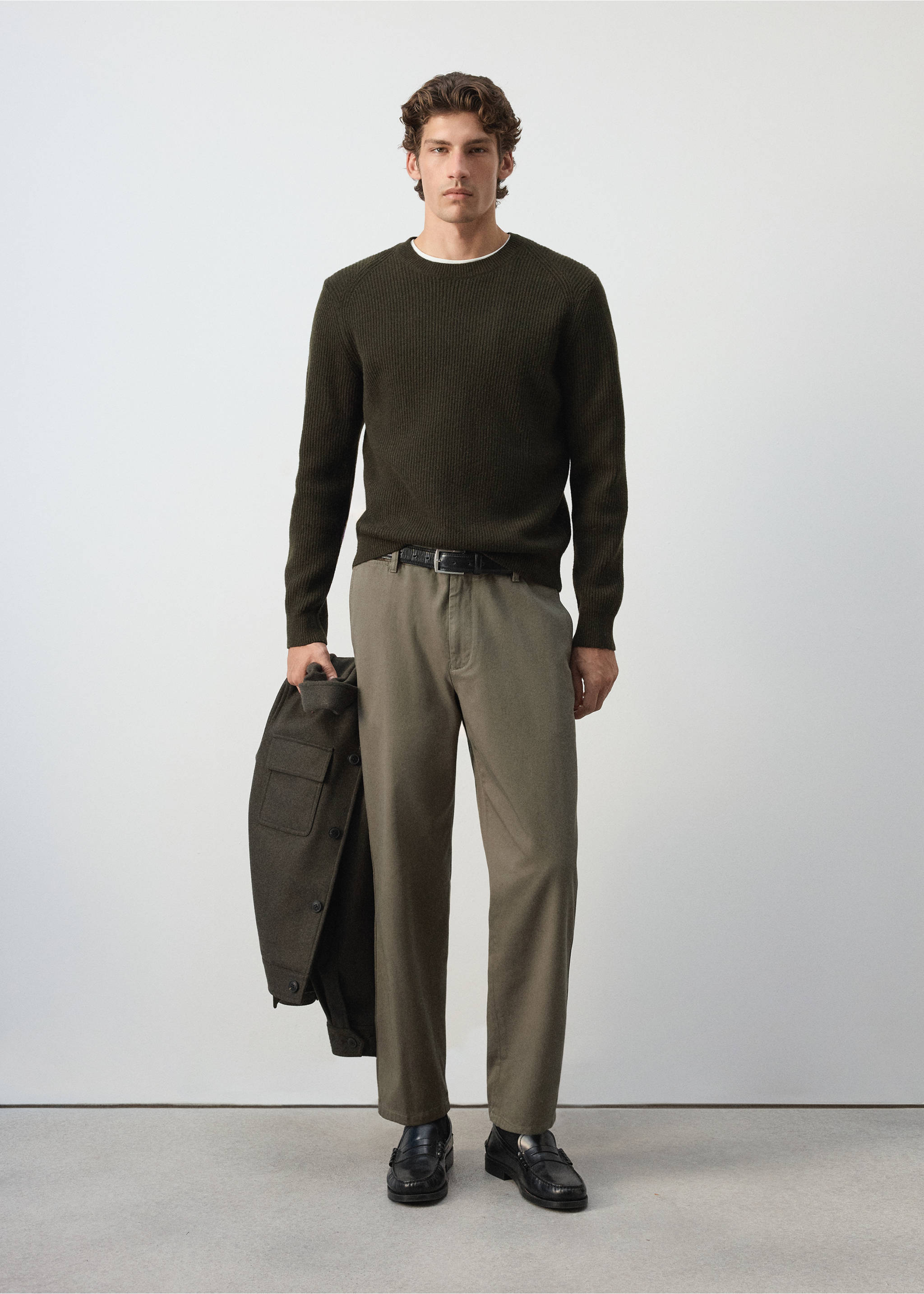 Dark green knitted crew neck jumper worn with trousers., Khaki. Ref: 37017919-00.