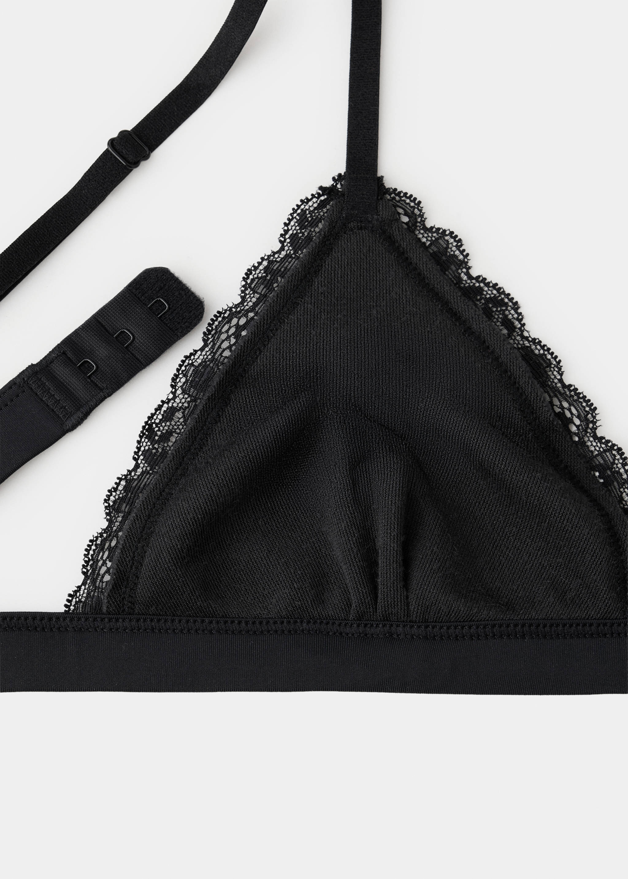 Black bralette with lace trim and adjustable straps.