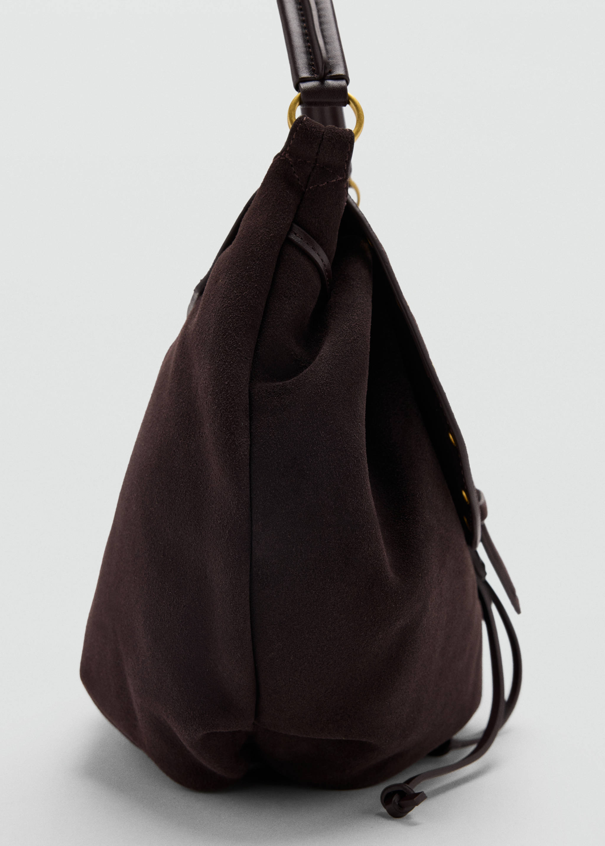 Dark brown suede shoulder bag with gold-tone hardware.
