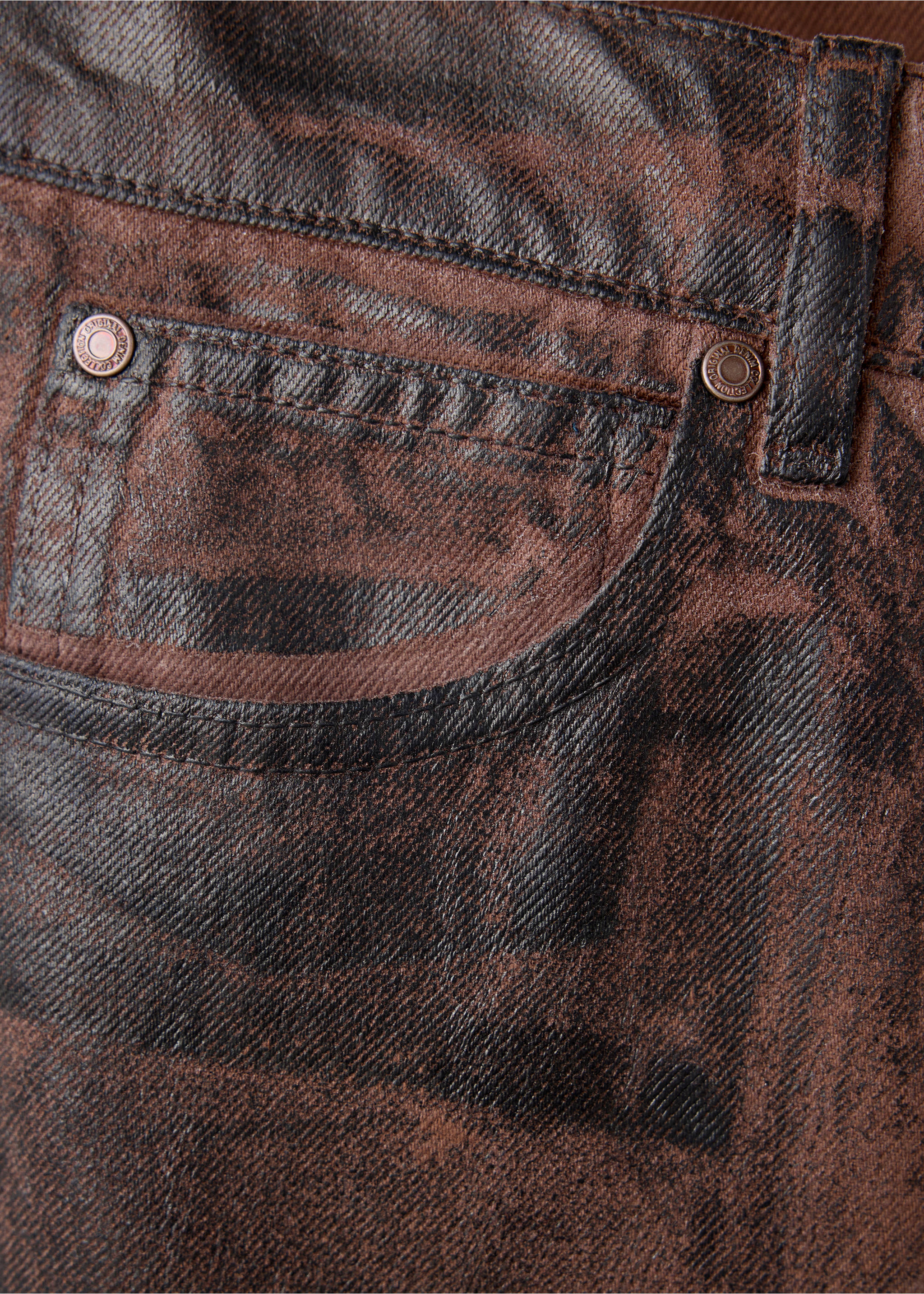 Brown denim trousers detail featuring a coin pocket and metallic rivets., Chocolate. Ref: 37017940-00.