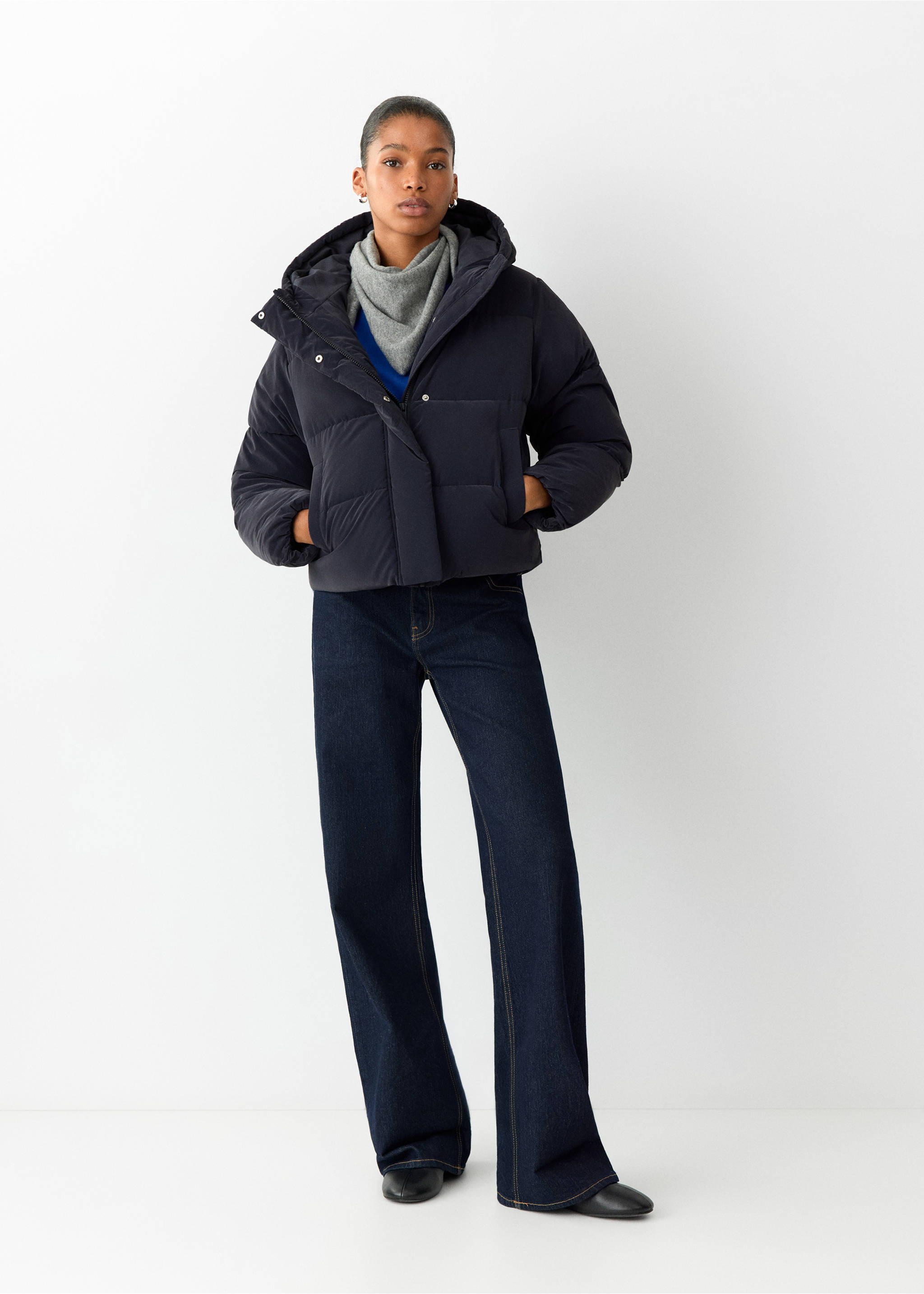 Dark navy blue hooded quilted anorak with a high neck, zip and snap closure., Navy. Ref: 37018266-00.