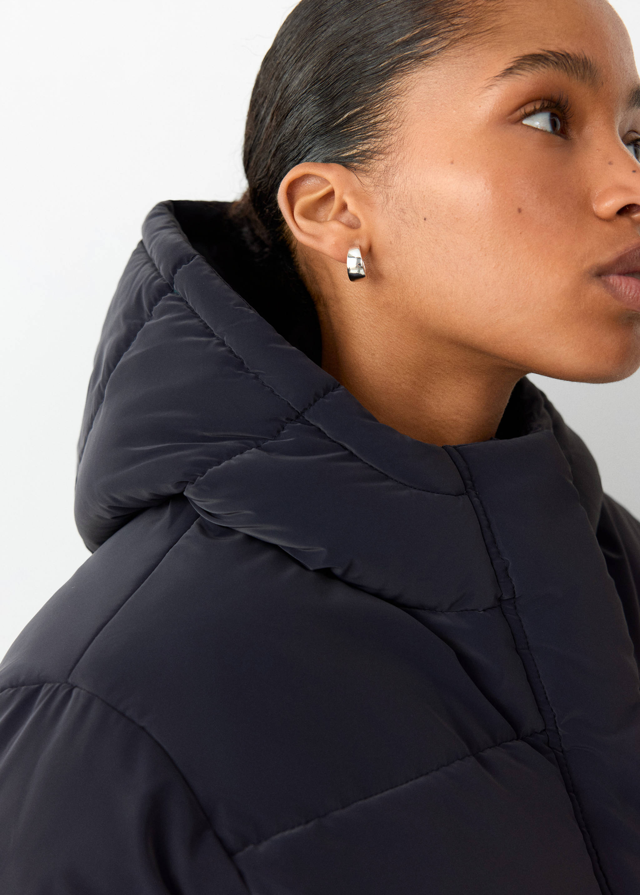 Close-up of a black hooded anorak.
