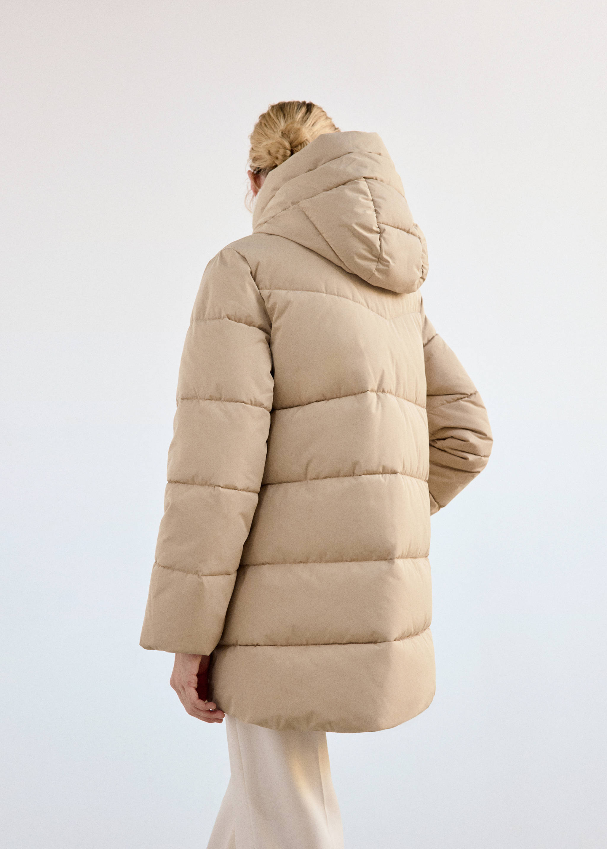 Beige quilted hooded anorak, back view