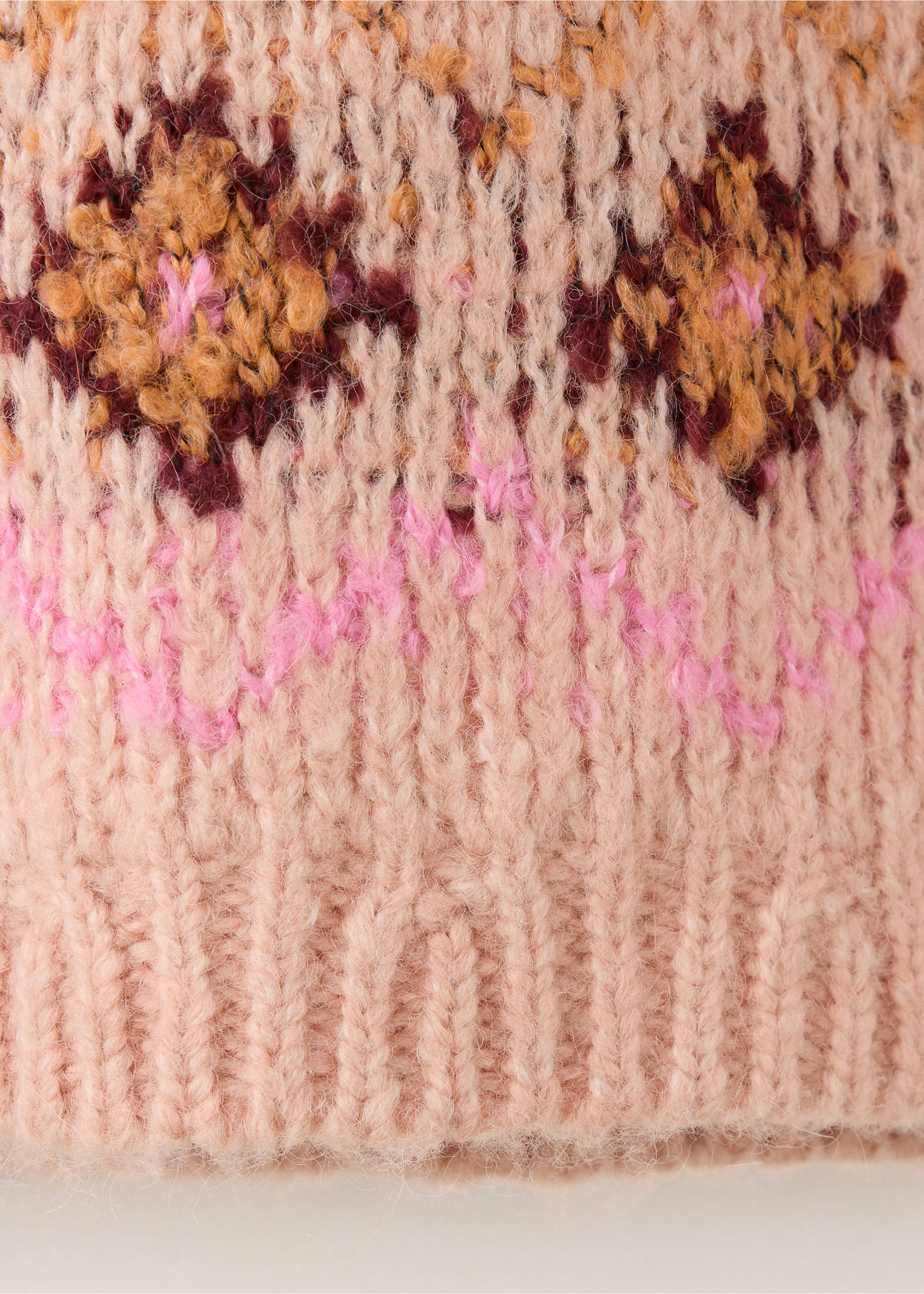 Primer plano del tejido de punto jersey afelpado en color rosa con una franja estampada., Melocotón. Ref: 37018286-00.