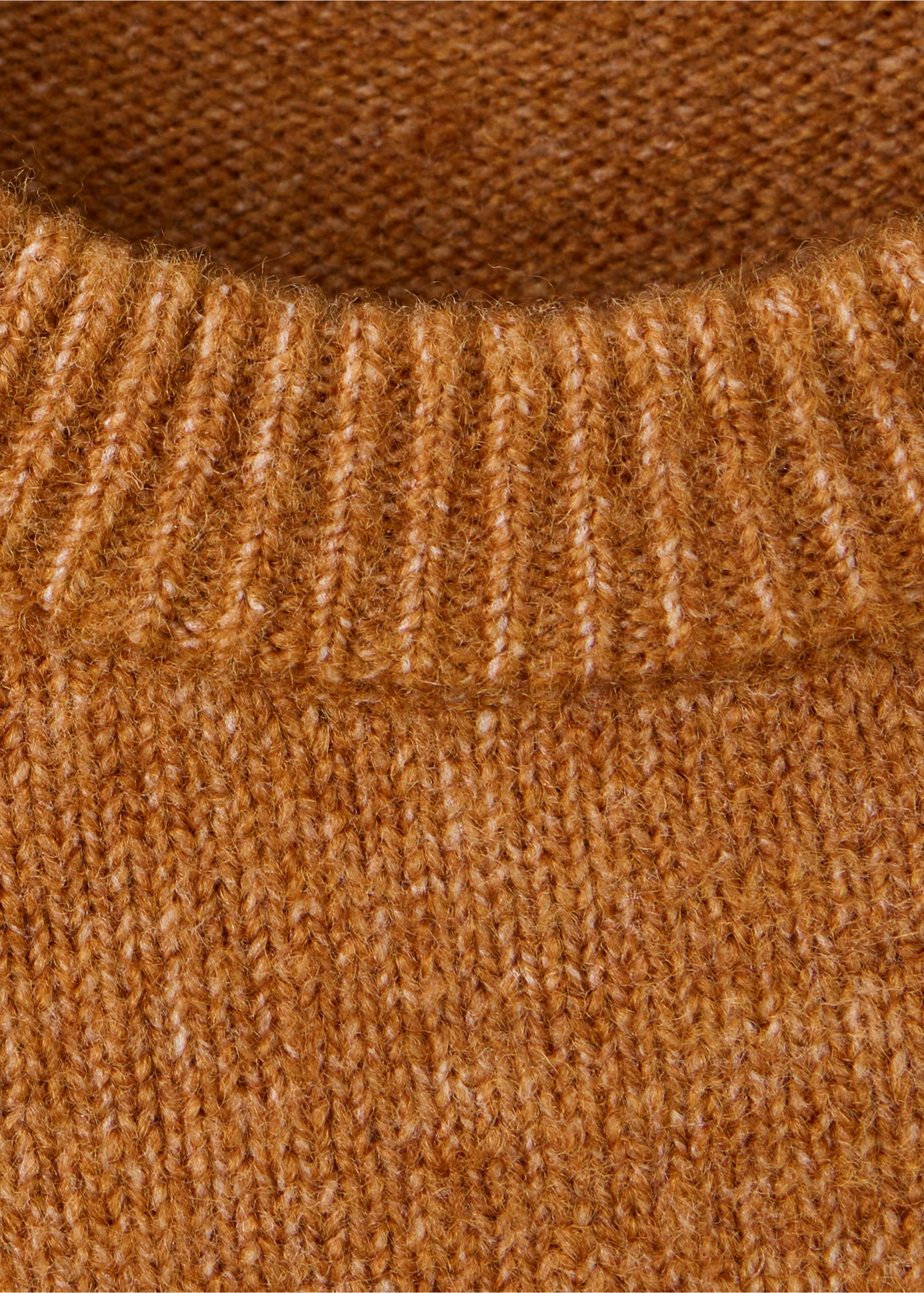 Close-up of a camel brown knitted sweater with a ribbed round neckline., Ochre. Ref: 37018287-00.
