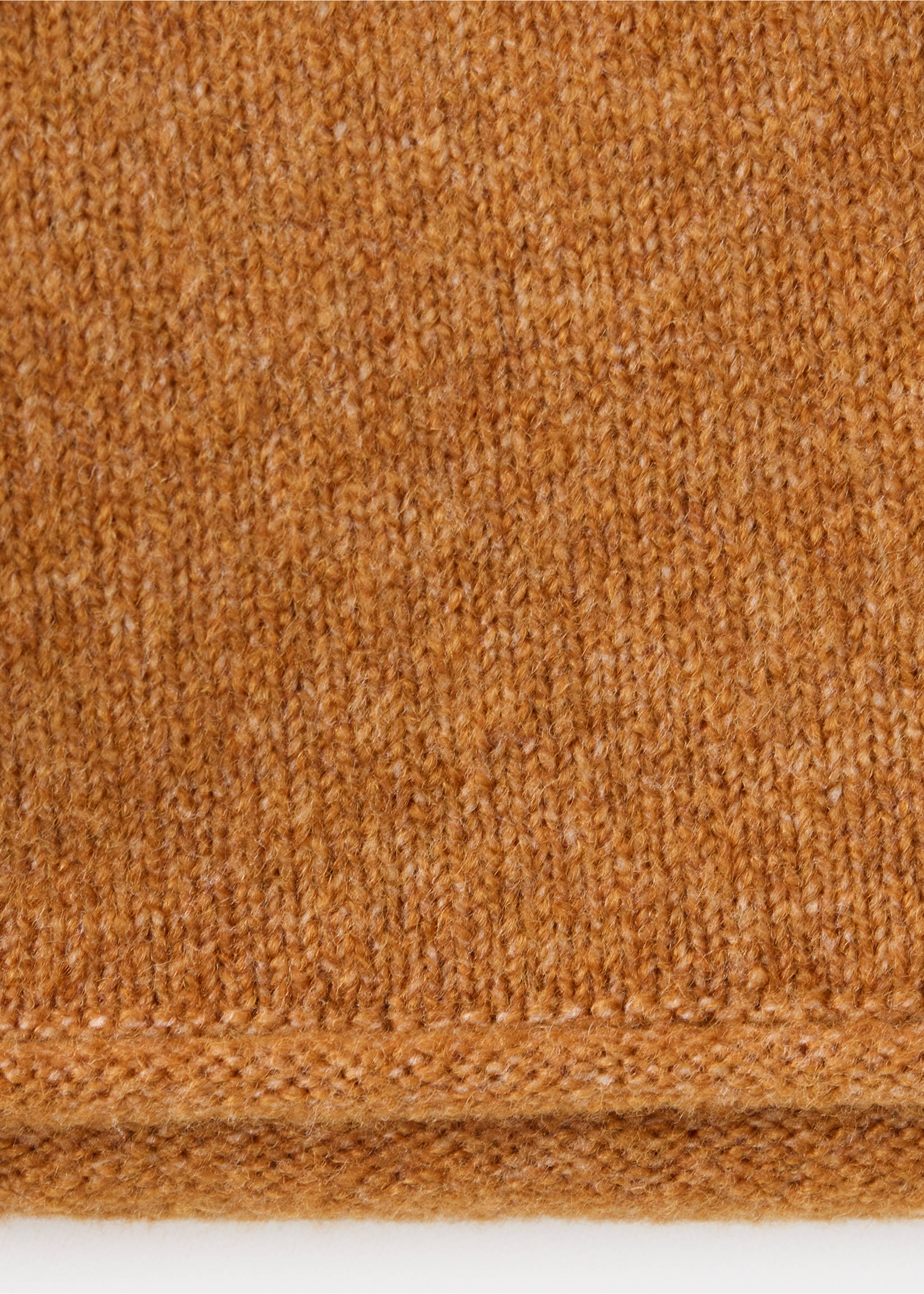 Close-up of brown knit sweater fabric texture., Ochre. Ref: 37018287-00.