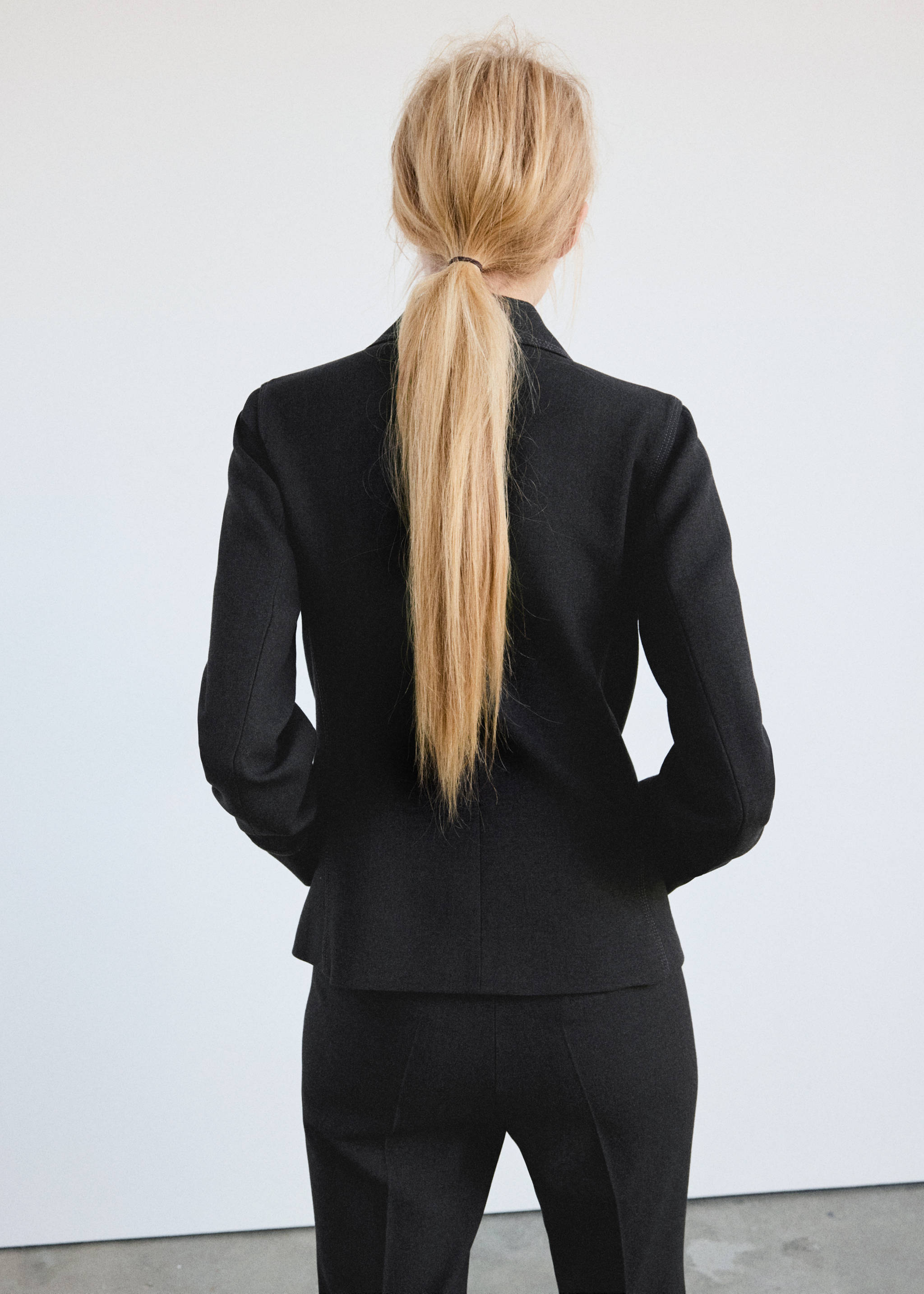 Black blazer, back view