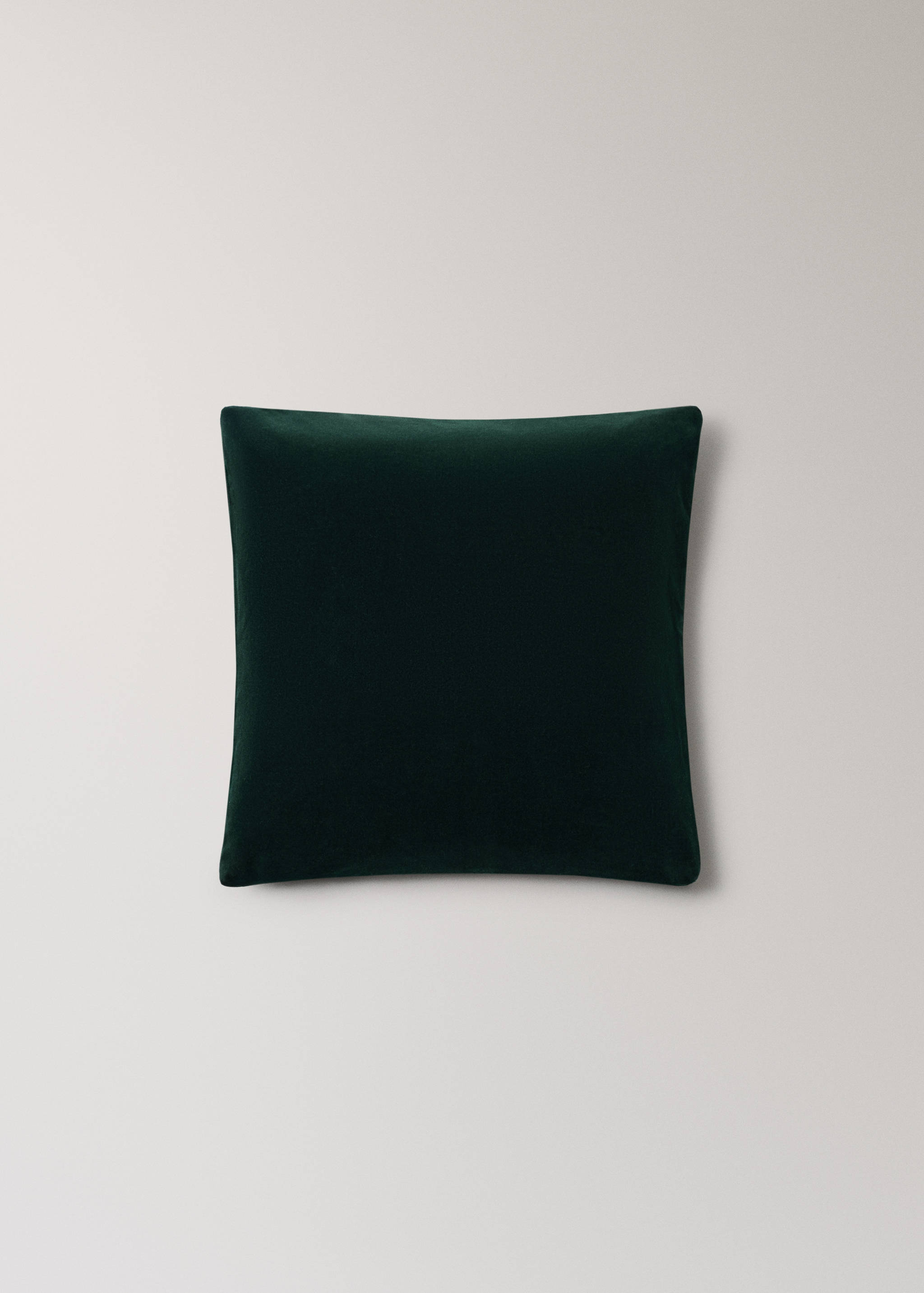 Dark green square cushion cover.