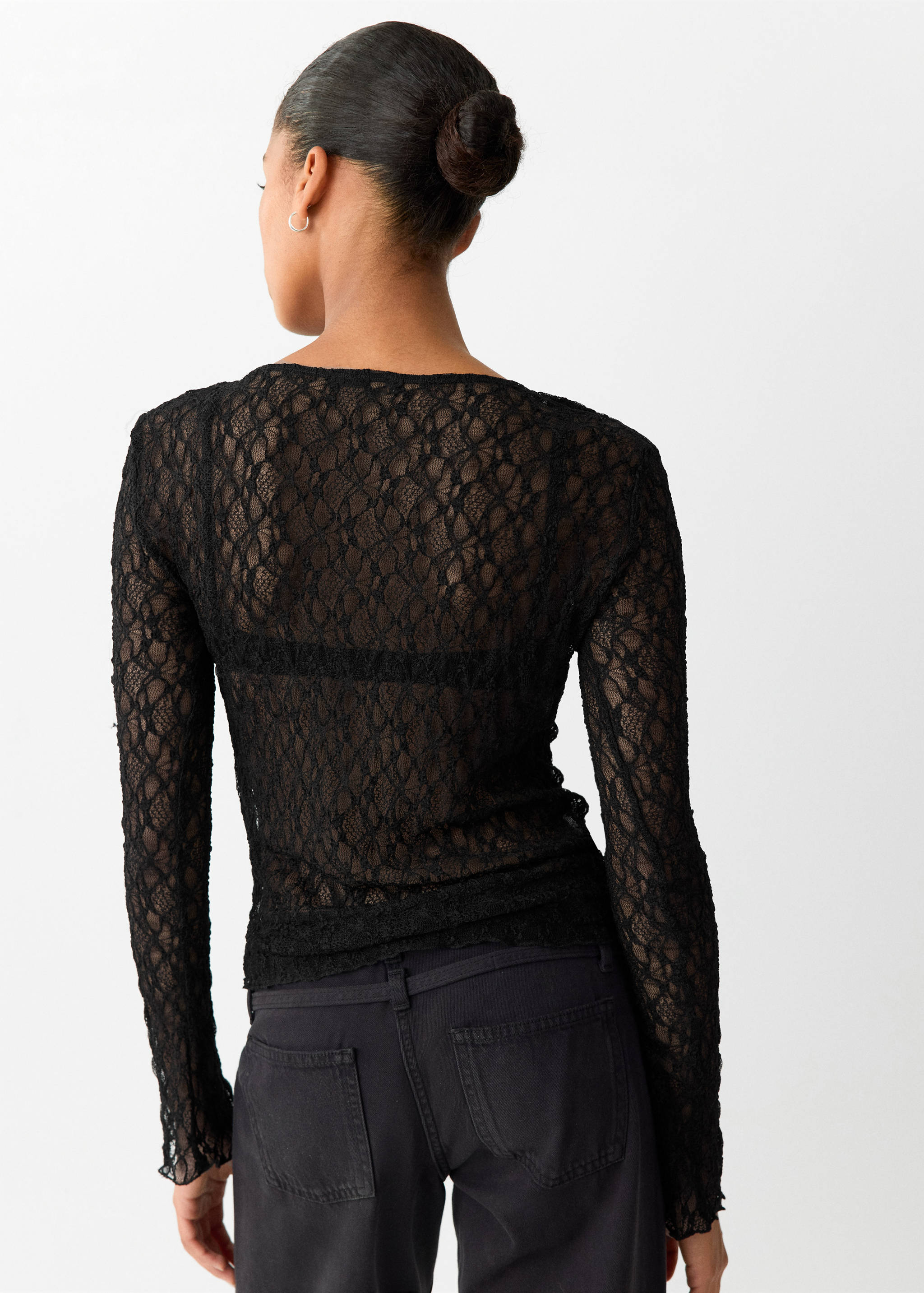 Black long-sleeved lace T-shirt shown from the back.