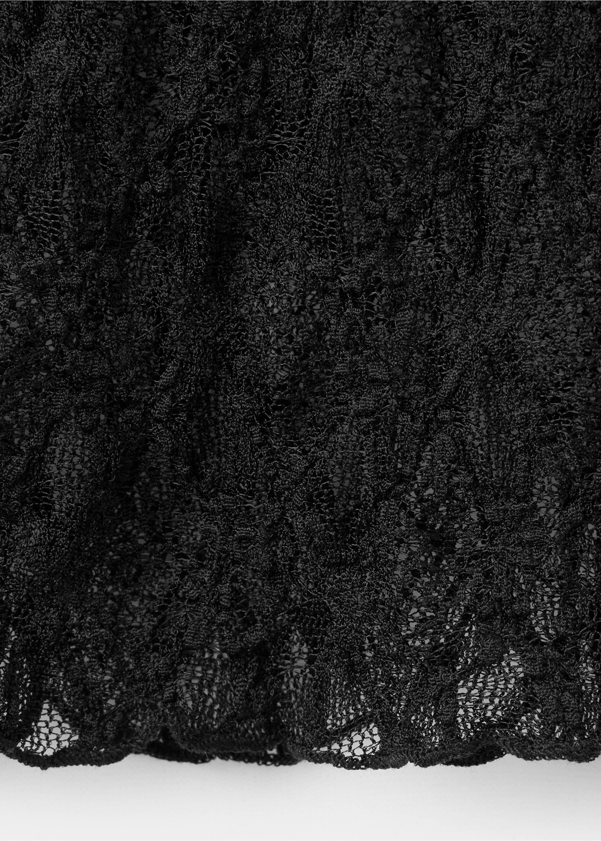 Close-up of black lace fabric on a T-shirt., Black. Ref: 37019123-00.