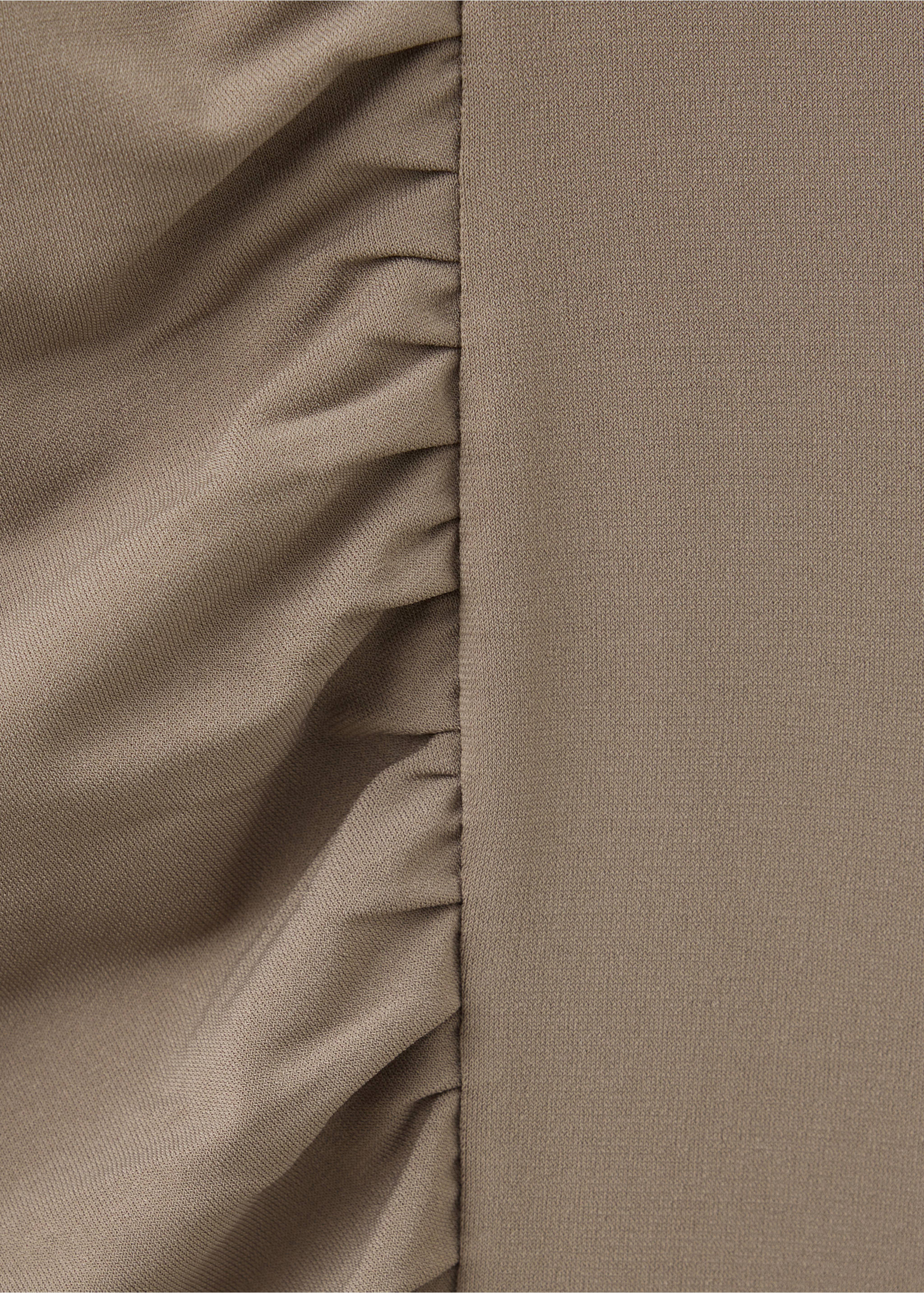 Close-up of taupe dress fabric featuring gathered ruching next to a smooth panel., Light/Pastel Brown. Ref: 37019138-00.