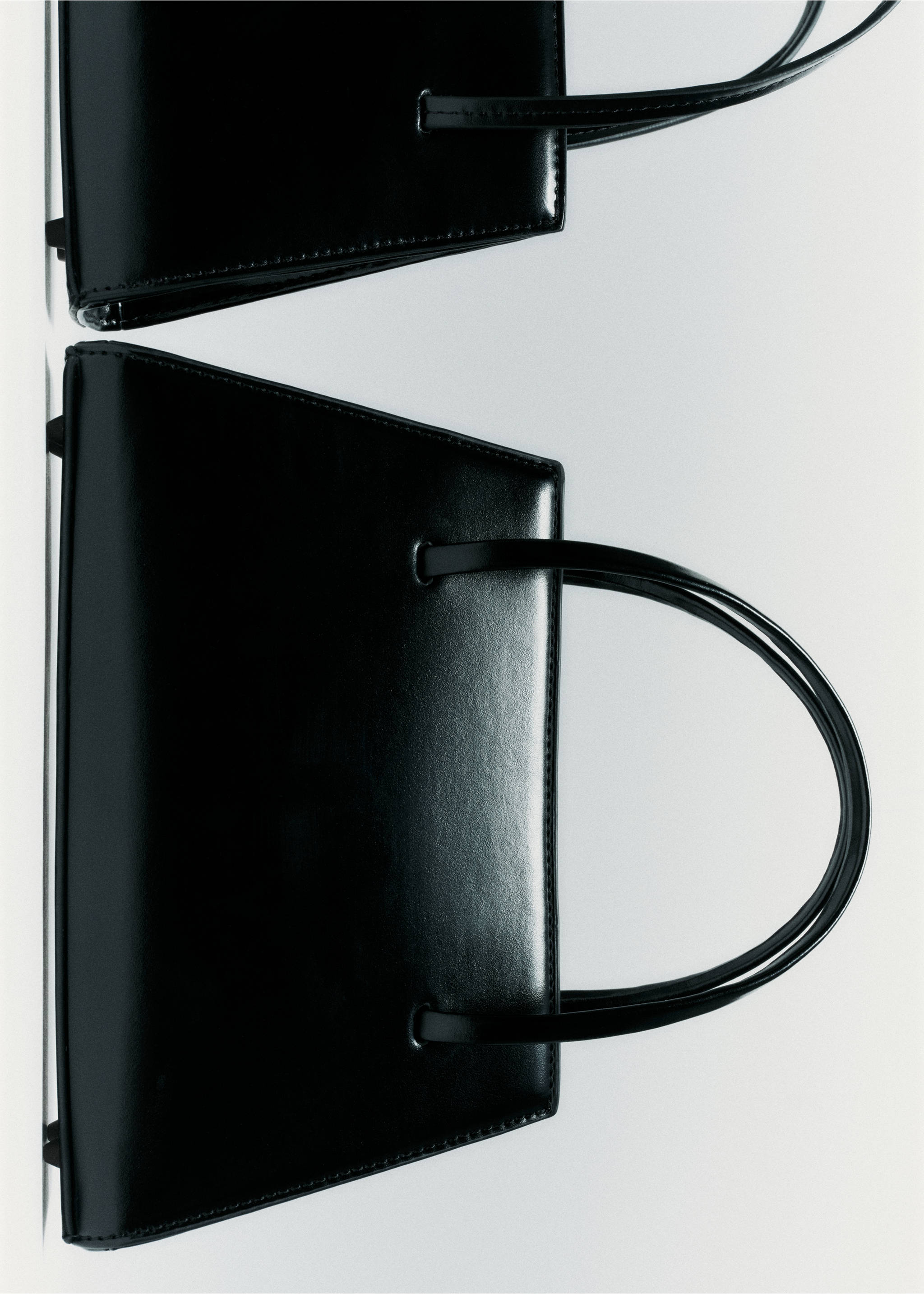 Structured black handbag with twin shoulder straps., Black. Ref: 37019143-00.