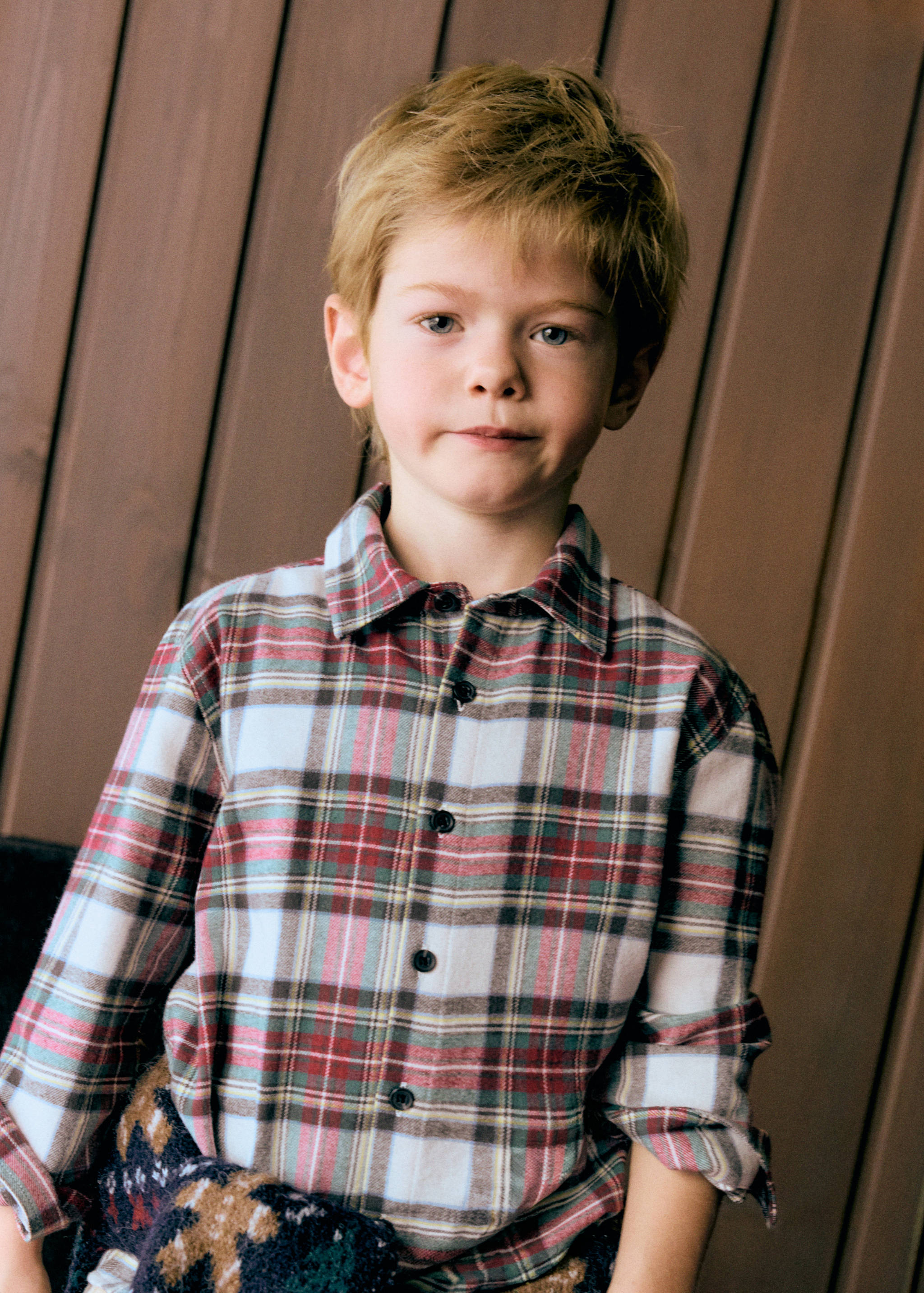 Boys' red, white, and blue plaid long-sleeve shirt with collar.