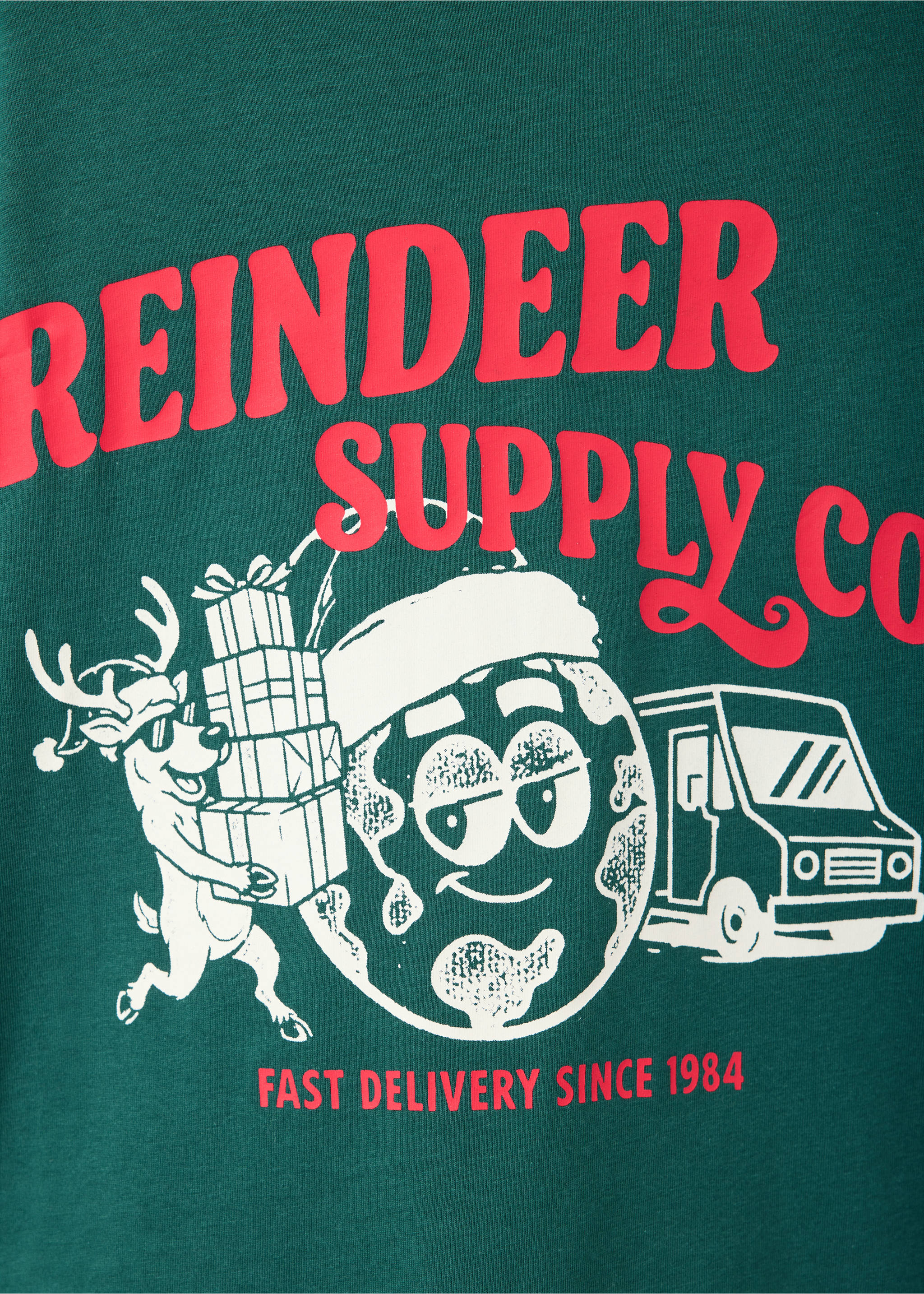 Green t-shirt detail with a festive pink and white Reindeer Supply Co graphic print., Dark Green. Ref: 37019214-00.