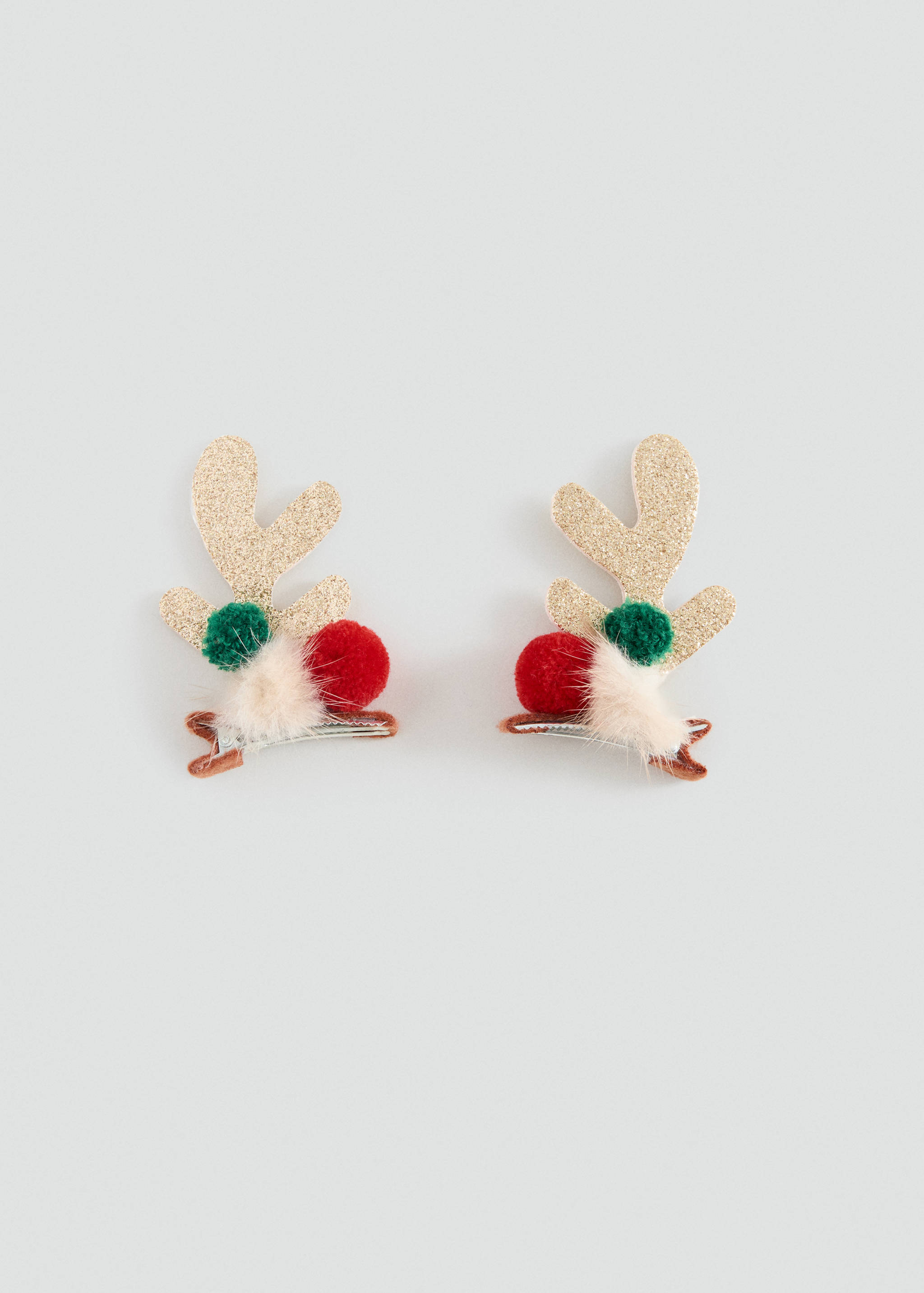 Pair of children's hair clips with glittery gold reindeer antlers, red, green, and faux-fur pom-poms.
