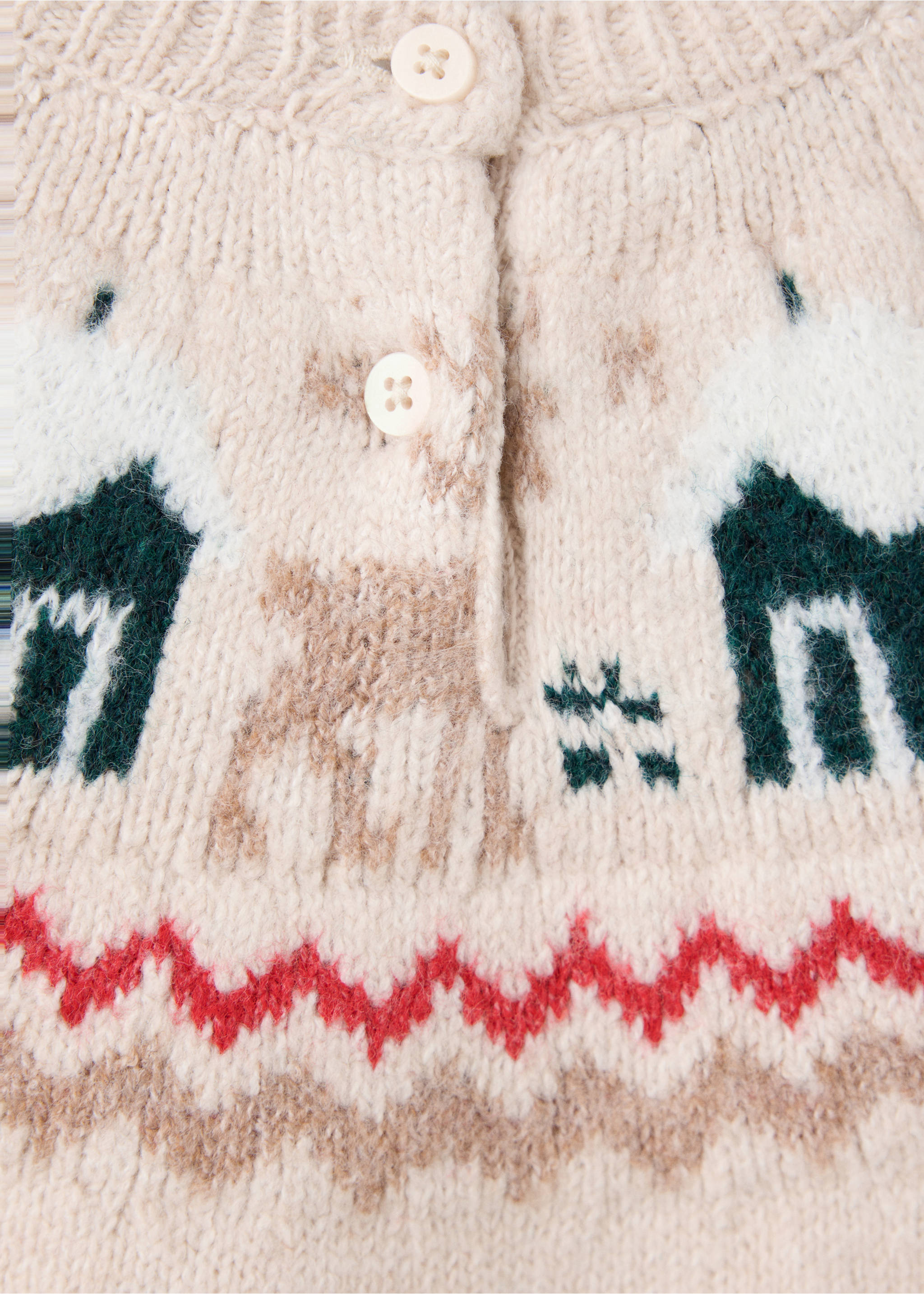 Close-up of a cream knit jumper with a winter fair isle pattern and button placket., Off White. Ref: 37019224-00.