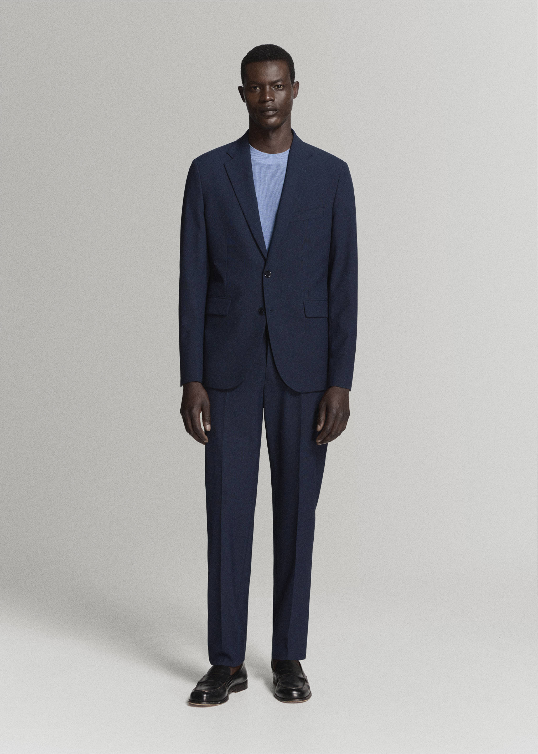 Navy blue trousers worn with a matching blazer and light blue sweater., Dark Navy. Ref: 37021364-01.