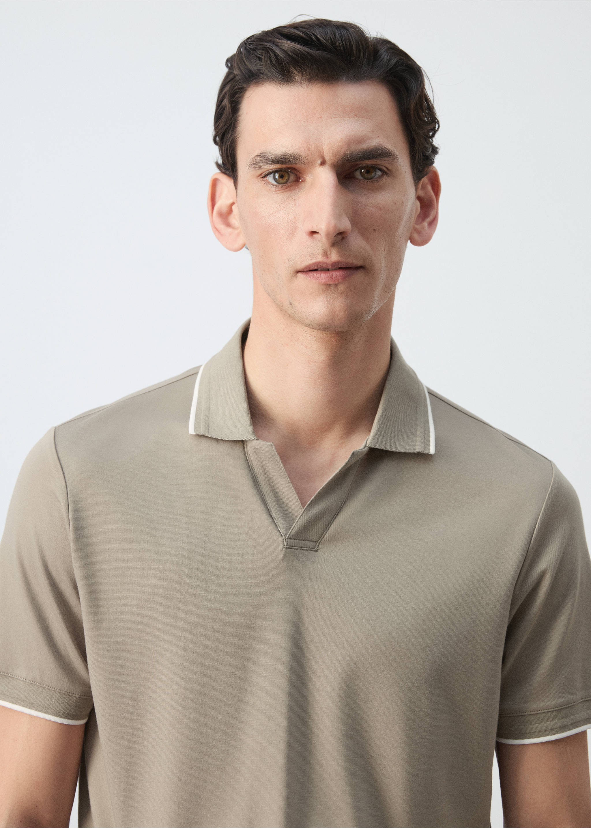 Plain cotton polo shirt - Details of the article 1, Ivory White. Ref: 37021370-00.