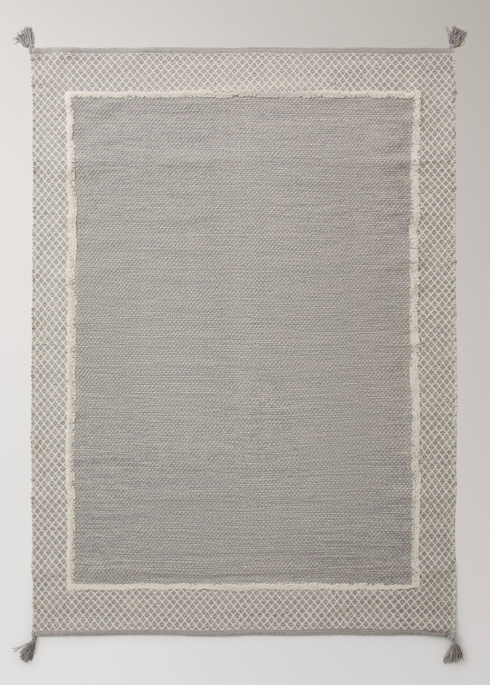 Jacquard yarn rug with fringed edges - Article without model