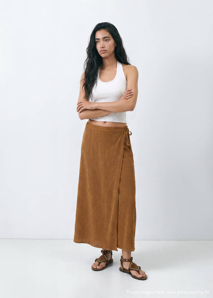 Halter top with embroidered details — Off White