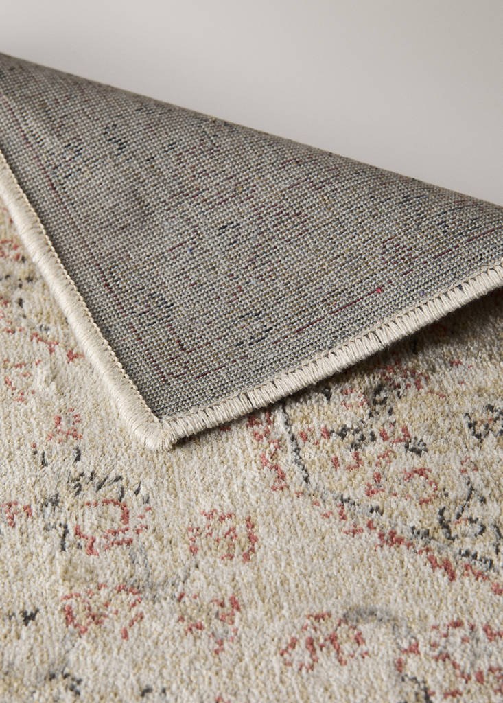 Small aged-effect rug — Beige