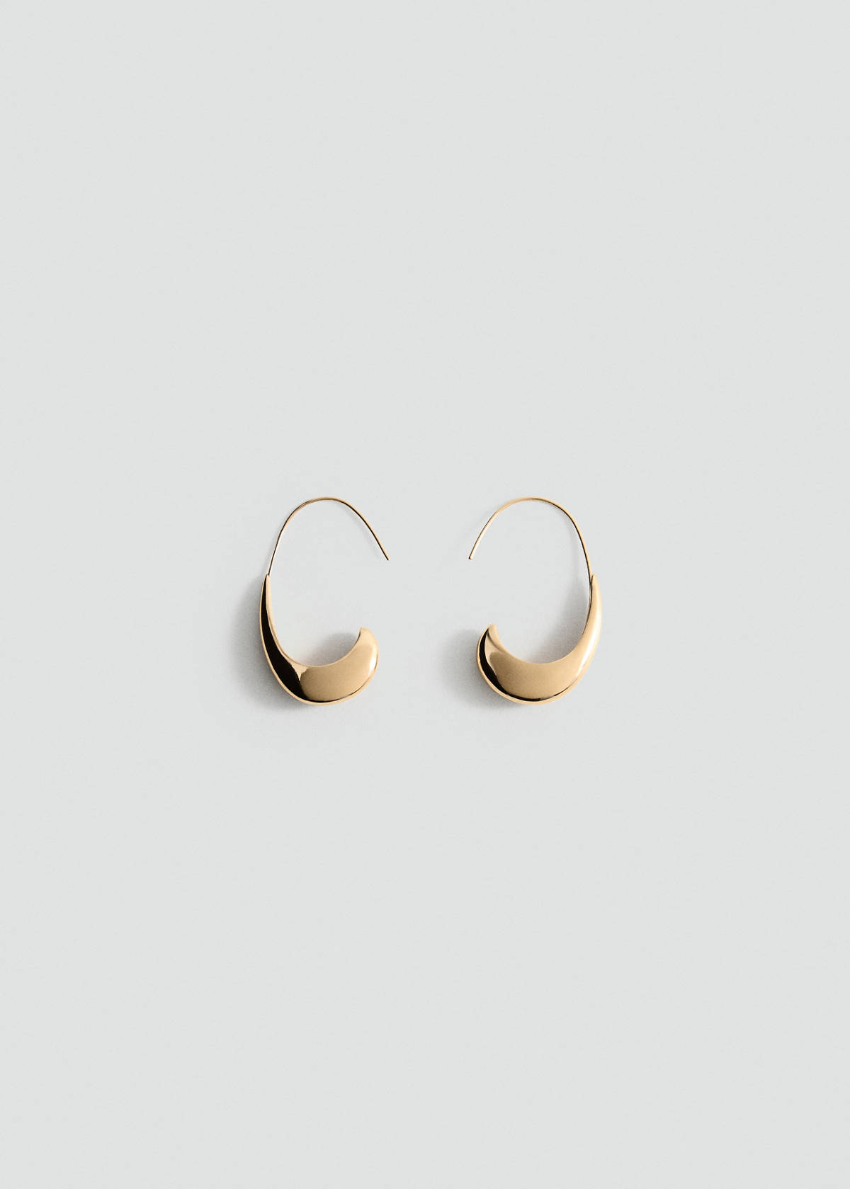 Twisted hoop earrings — Gold