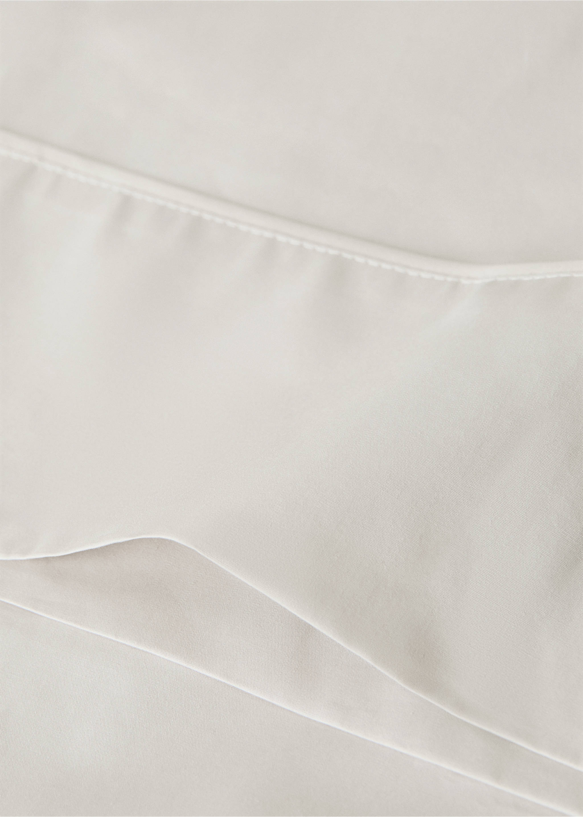 300-thread-count cotton percale pillowcase with piping detail, 45 x 110 cm - Details of the article 1, Sand. Ref: 37022979-00.