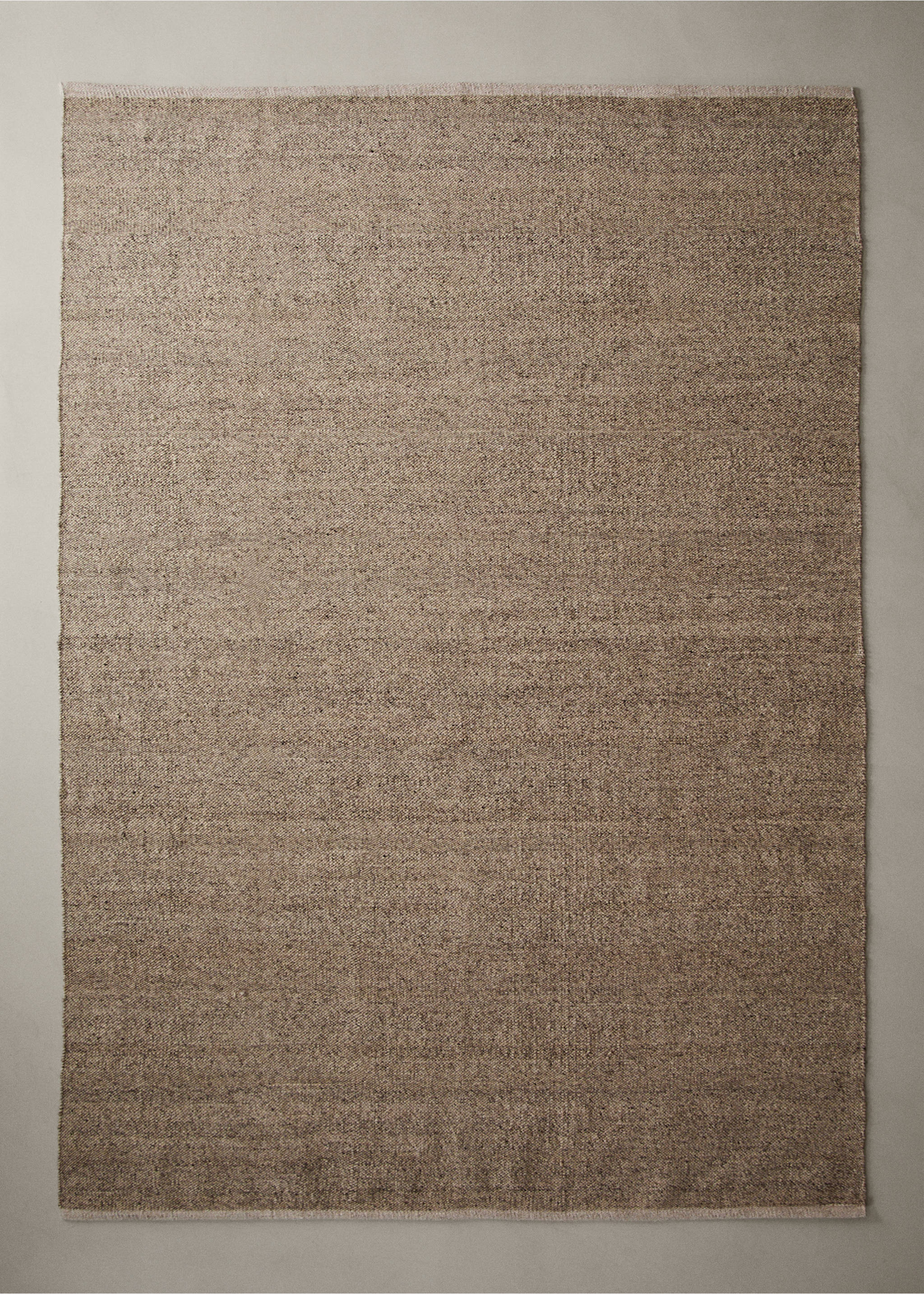 Textured brown woven yarn rug with short fringe details., Medium Brown. Ref: 37023279-00.
