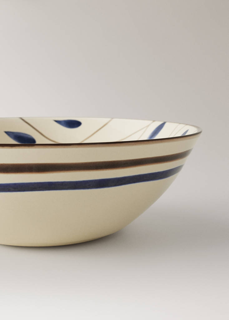 Stoneware bowl with hand-painted design — Vibrant blue