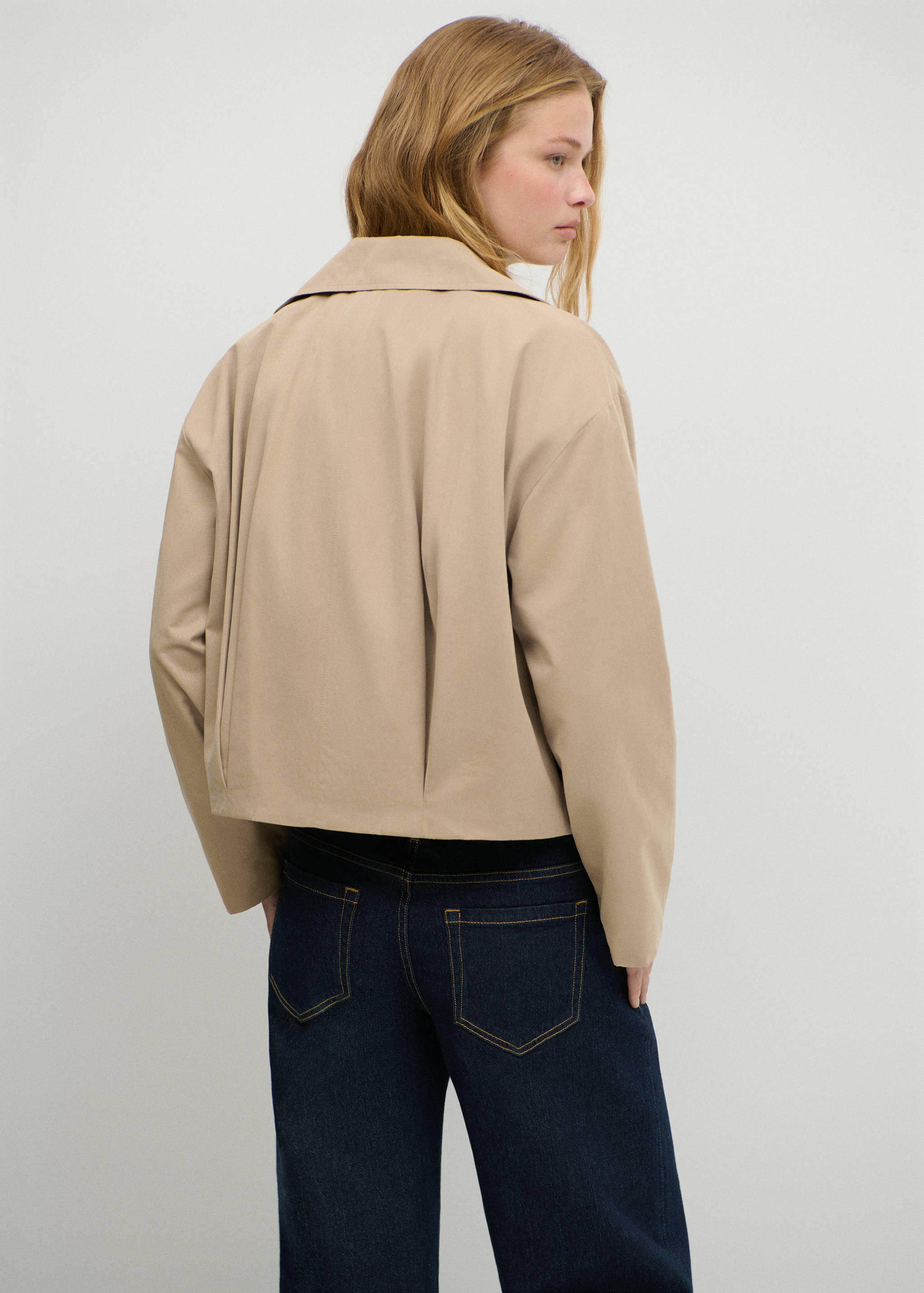 Short trench coat - Reverse of the article