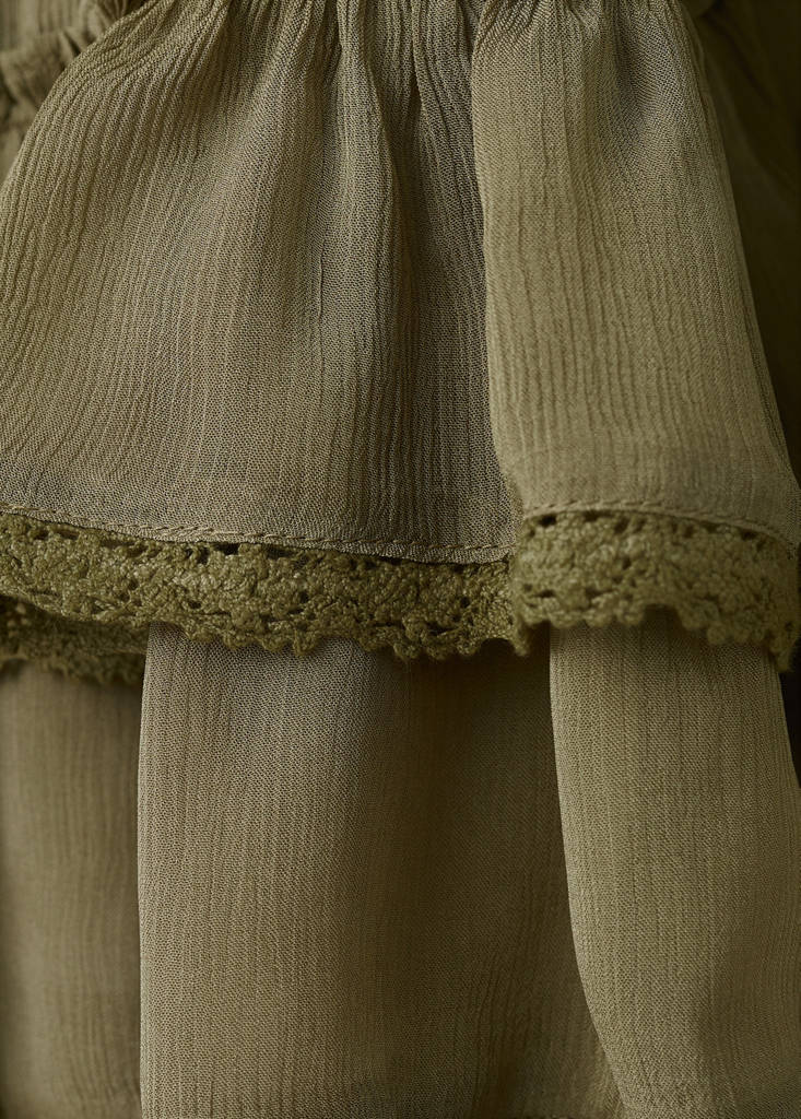 Ruffle blouse with lace details — Green