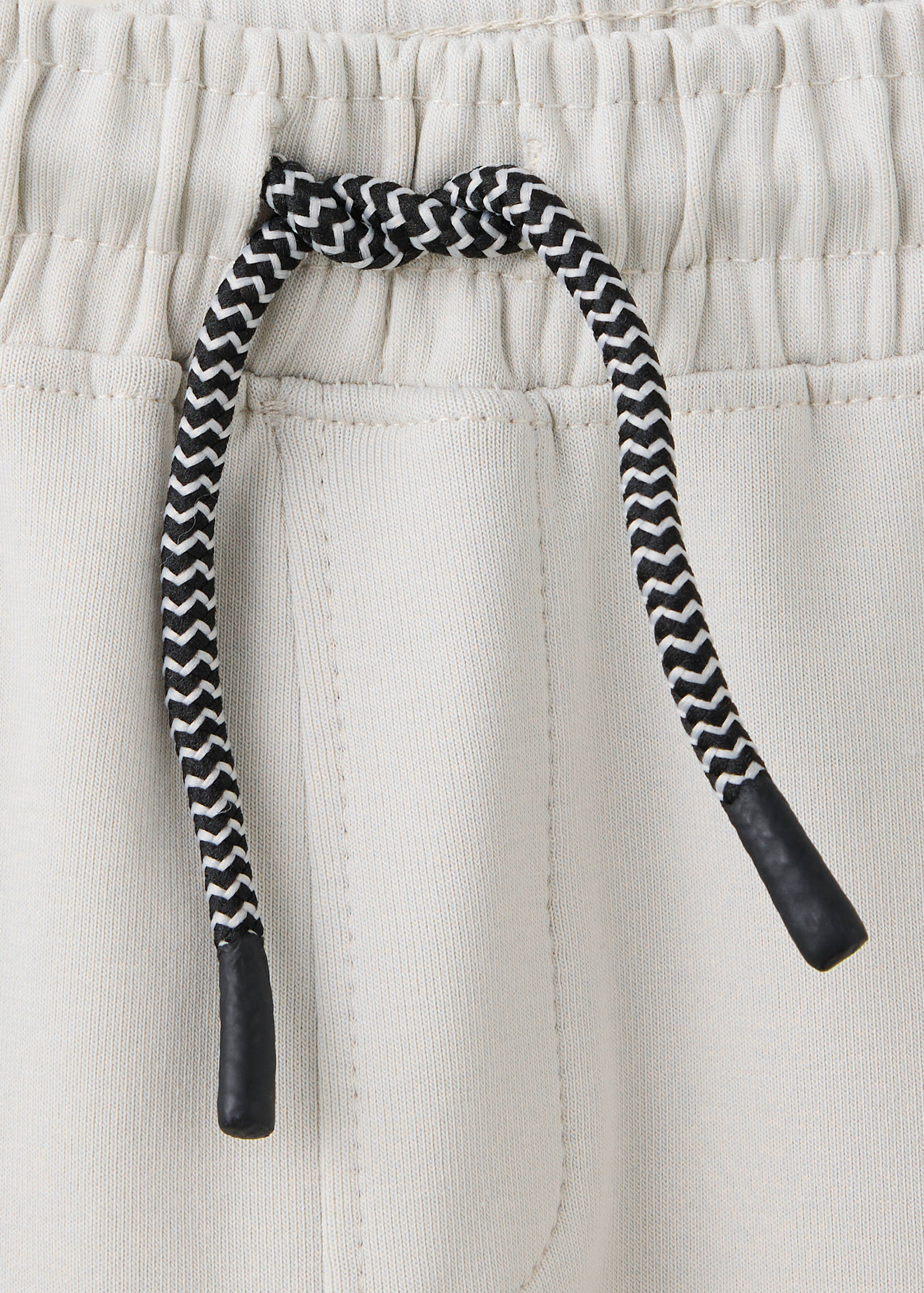 Cotton jogger-style trousers - Details of the article 8